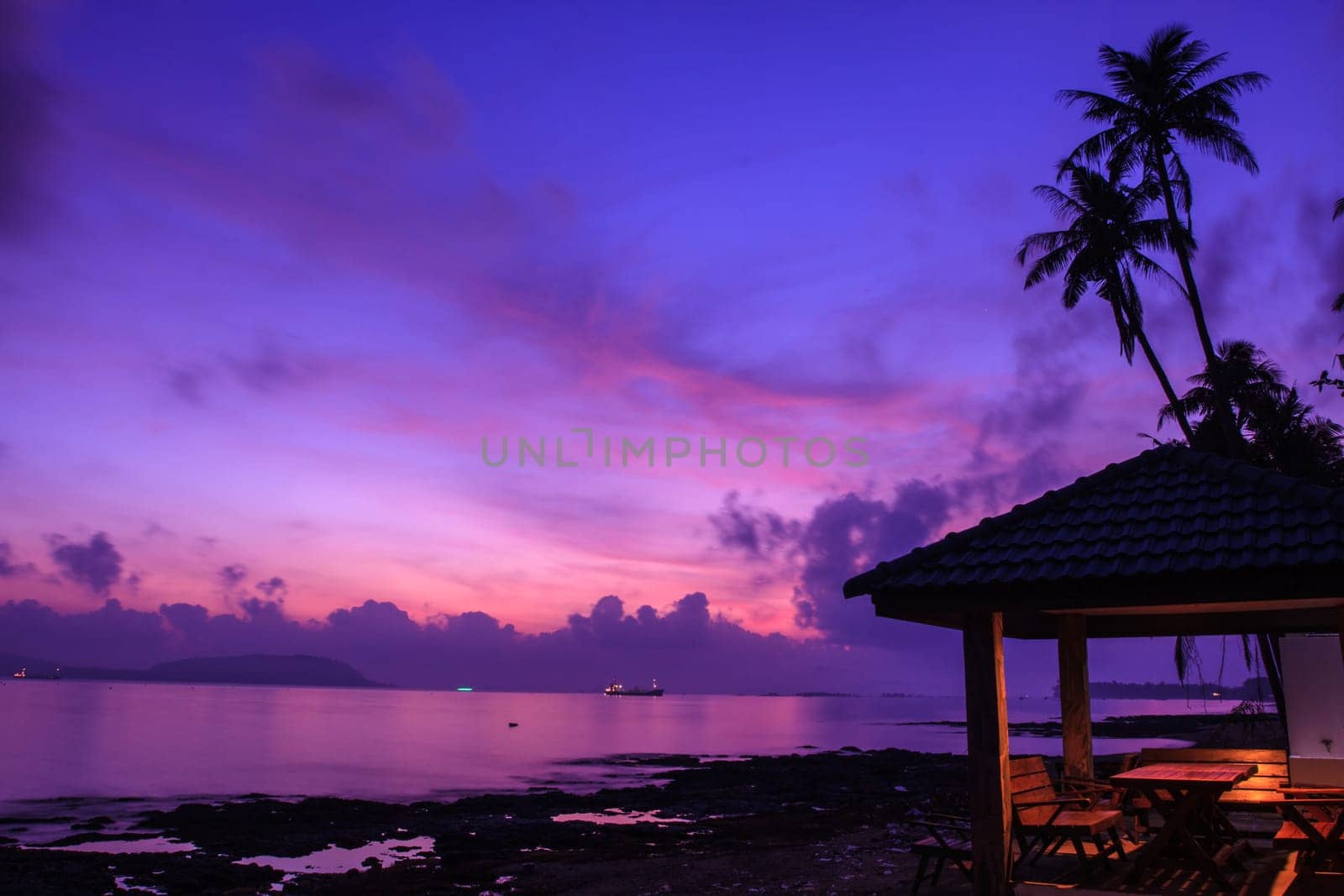 beautiful sunrise on beach and tropical sea in summer