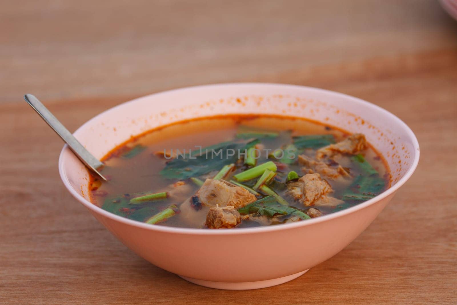 thai food and tom yum pork on table