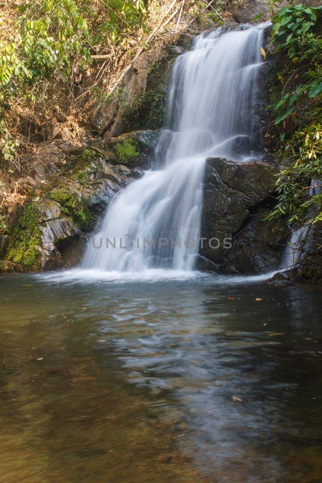 Thor Thip waterfall in thai national park.waterfall in the deep forest on mountain