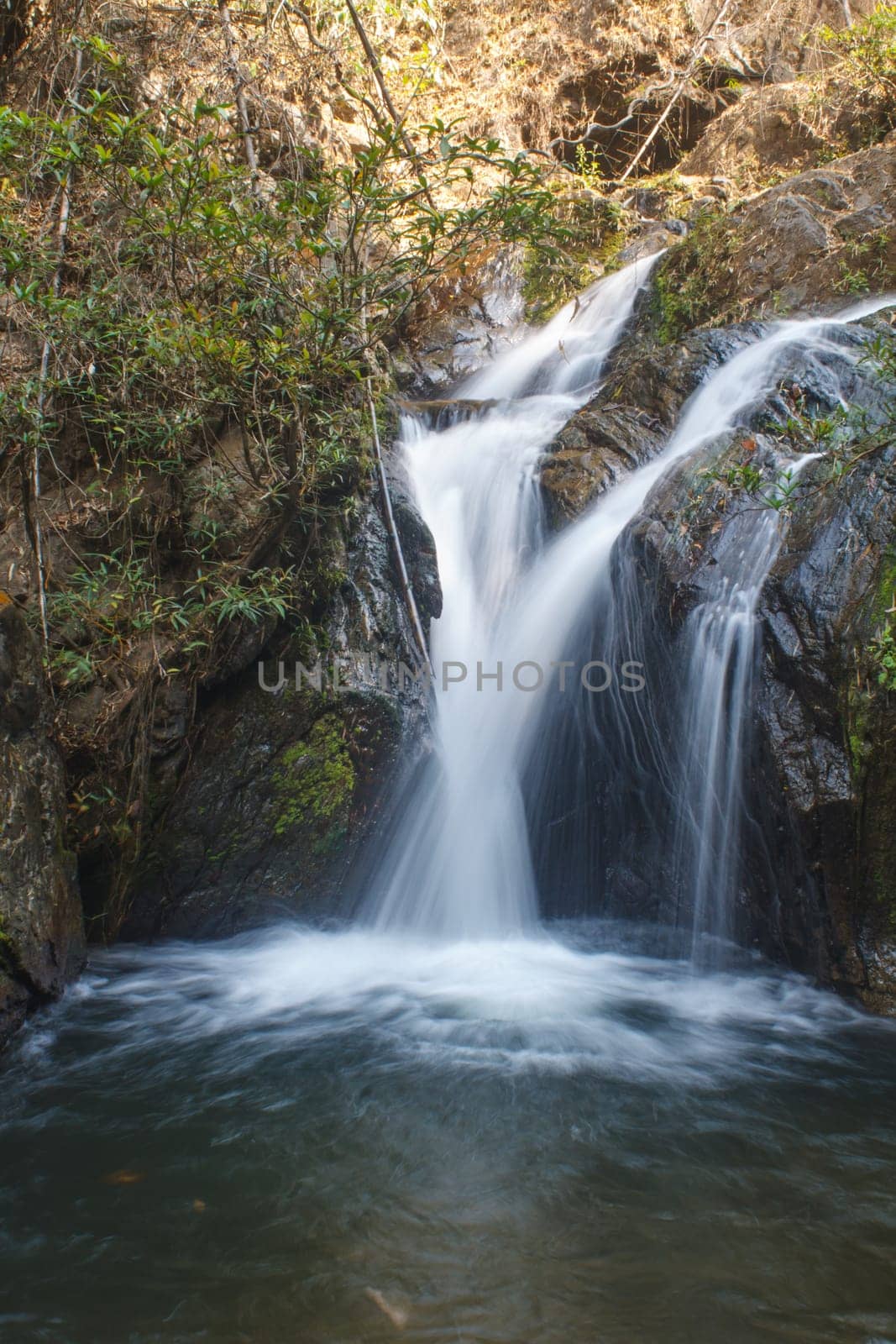 Thor Thip waterfall in thai national park.waterfall in the deep forest on mountain