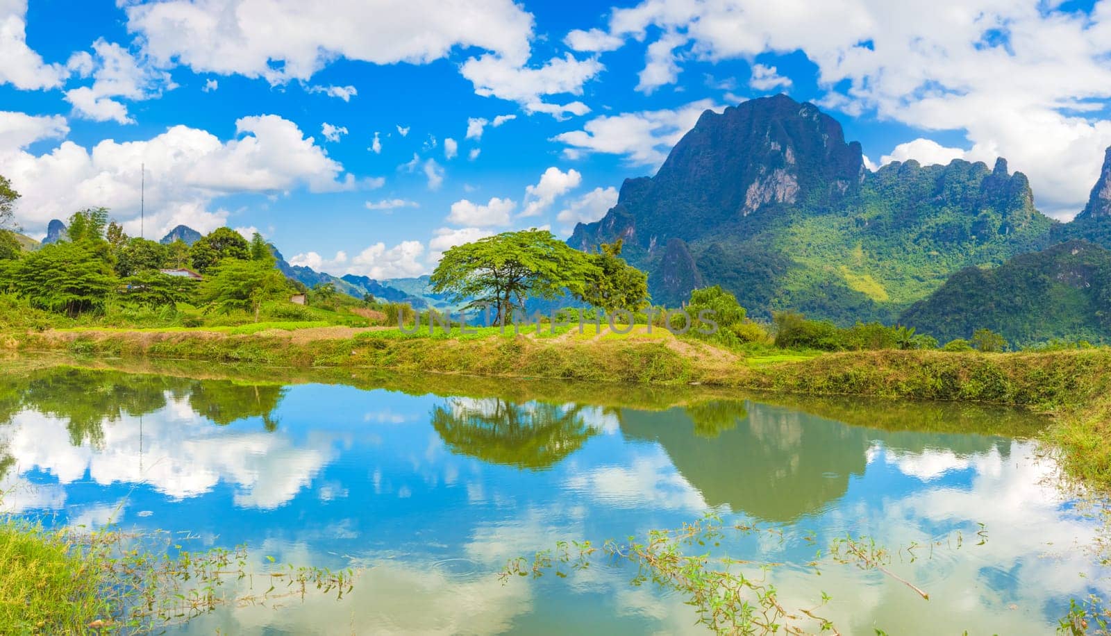 Beautiful landscape, pond on the foreground. Vang Vieng, Laos.