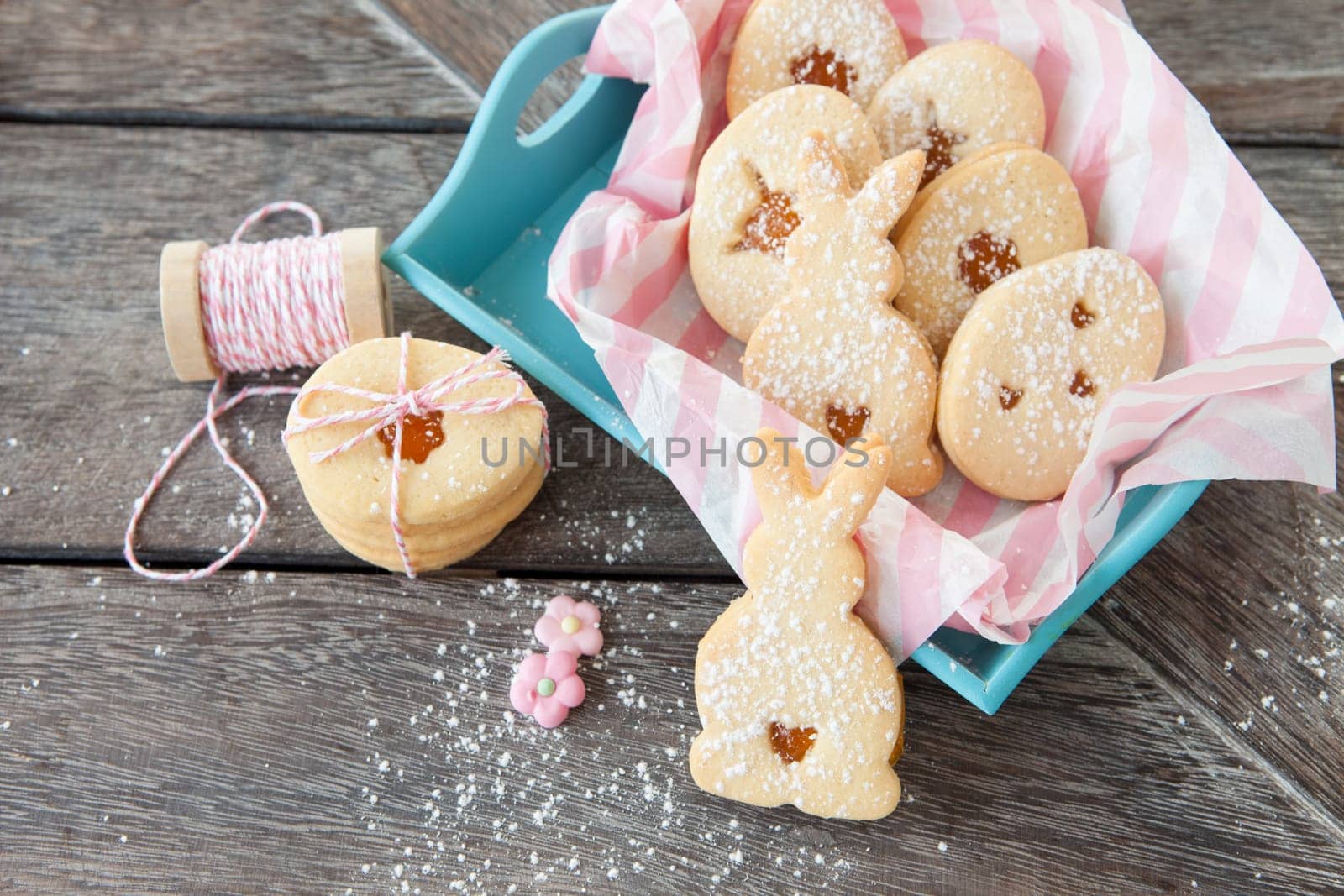 Folded places with jam and icing sugar for Easter