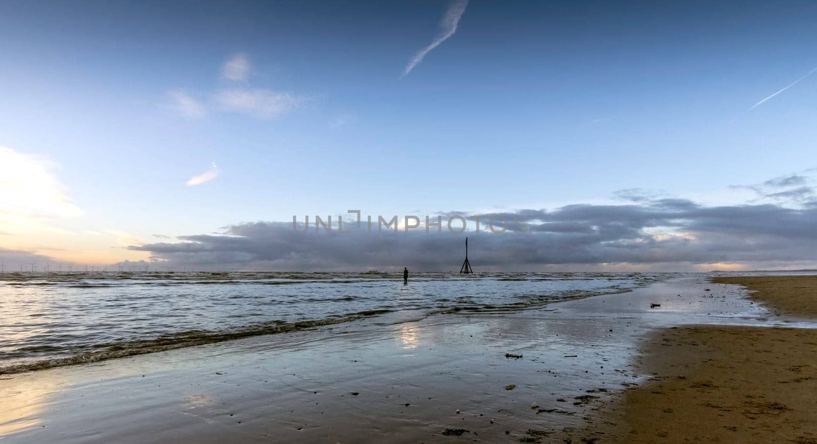 Sunset on Crosby Beach in winter - Crosby, Liverpool, United Kingdom