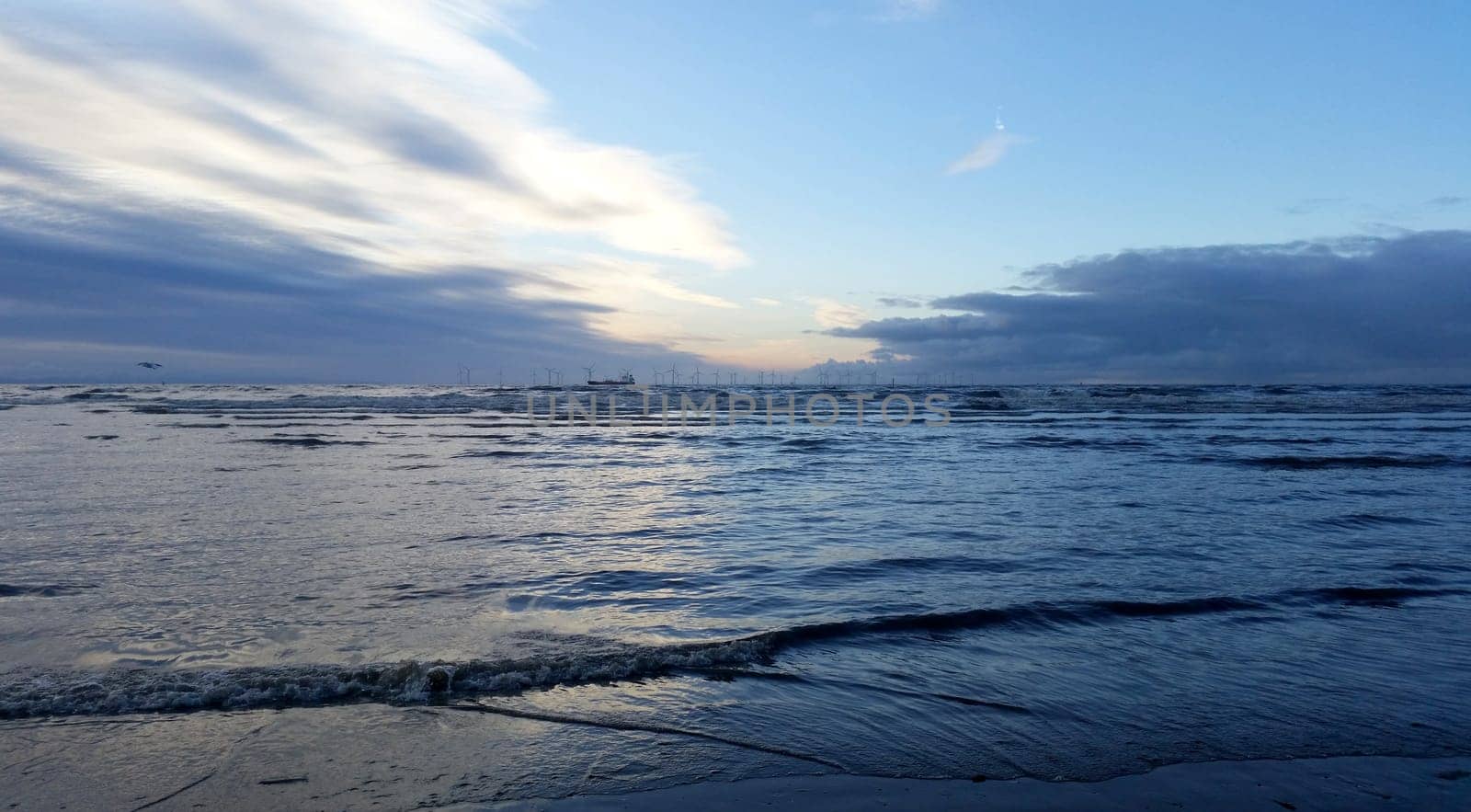 Sunset on Crosby Beach in winter - Crosby, Liverpool, United Kingdom