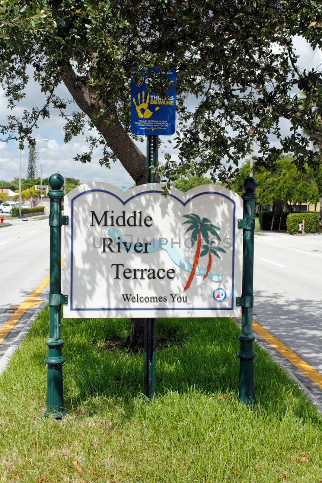 Fort Lauderdale, FL, USA - August 25, 2014: Middle River Terrace Welcomes You entrance sign to this neighborhood. Middle River Terrace welcoming sign in a median