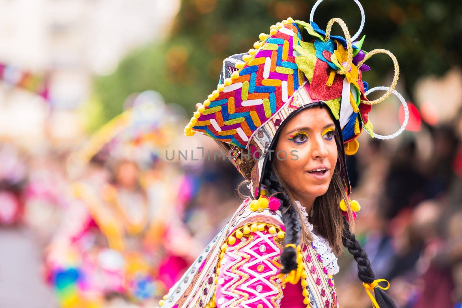 Badajoz, Spain, sunday. February.26. 2017 Participants in colorful costumes take part in the carnival parade in Badajoz 2017