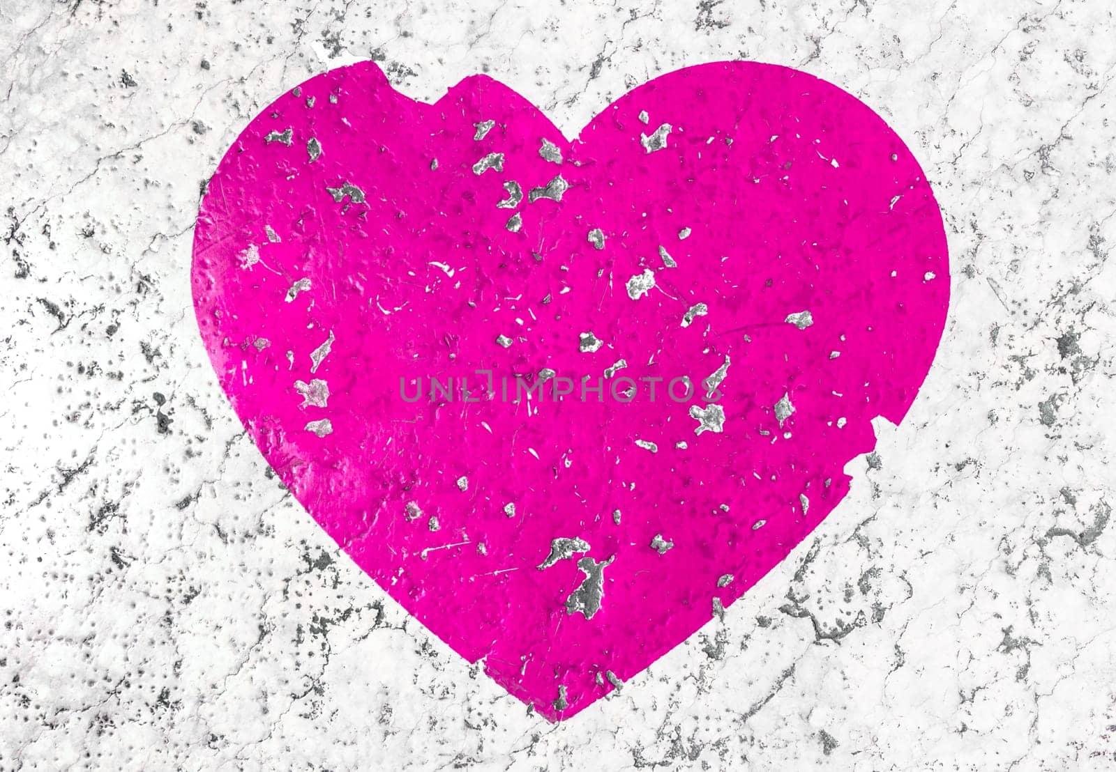 Conceptual broken heart shape on floor. Point of view perspective used. Love and romantic symbol in Valentine's Day background.