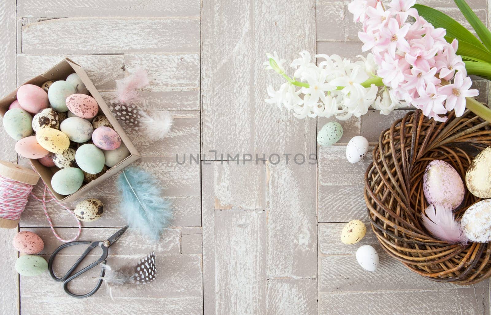 Colorful Easter decoration on a rustic wooden background
