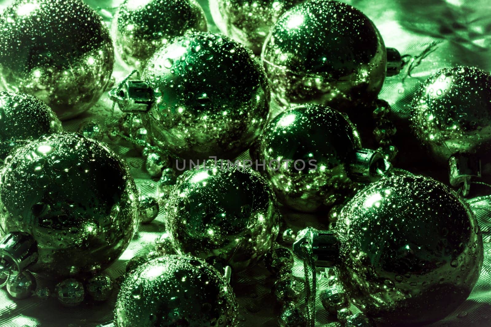 Silver spheres and pearls texture as Christmas decoration.