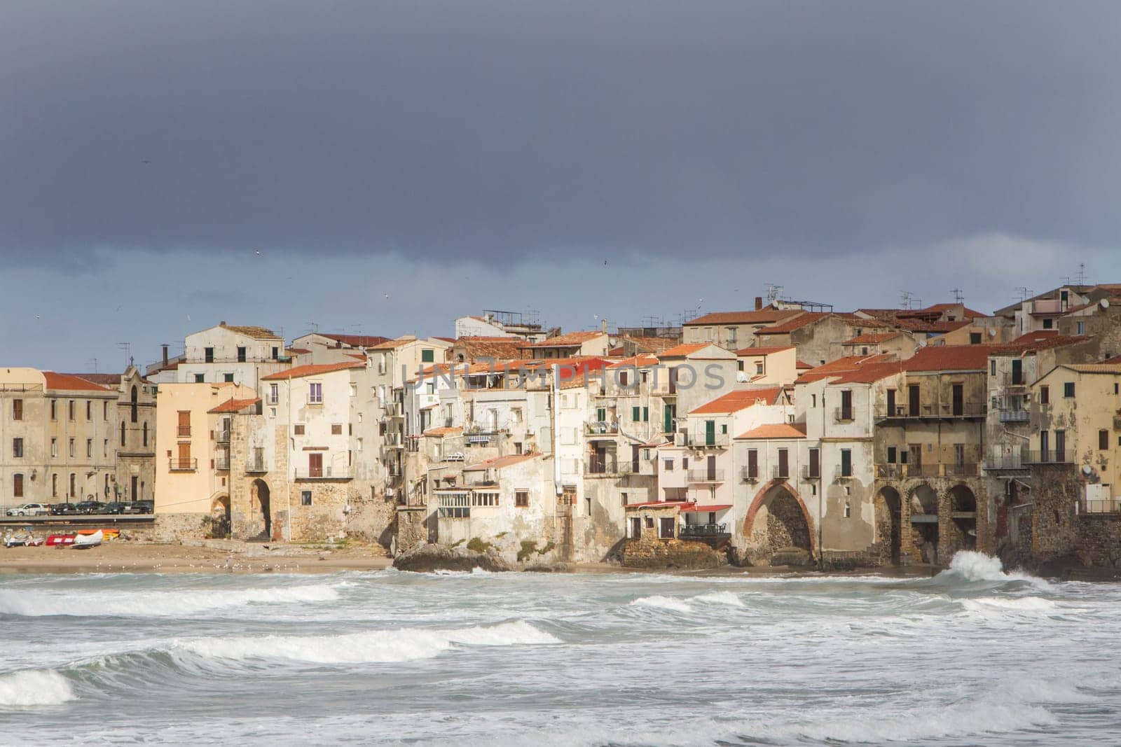 European Coastal travel townof Cefalu in Sicily, Italy in winter storm