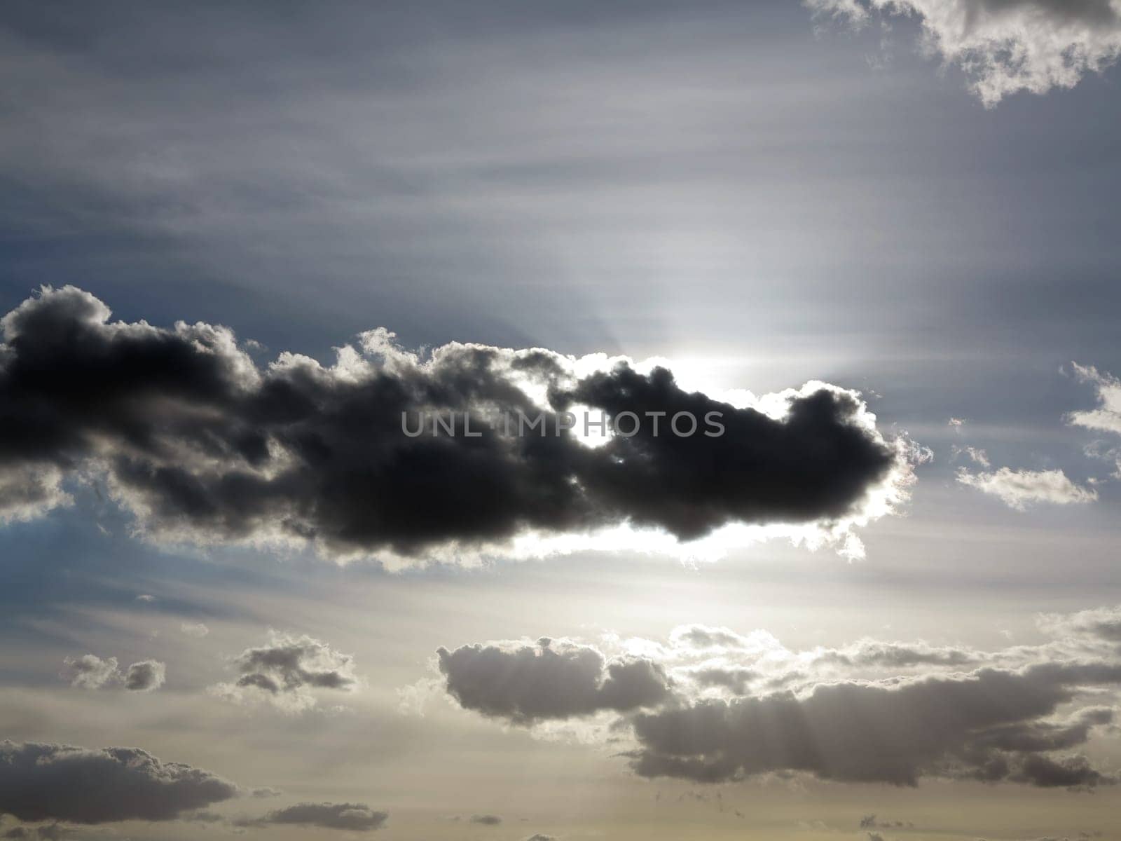Dark cloud on the sky in backlight