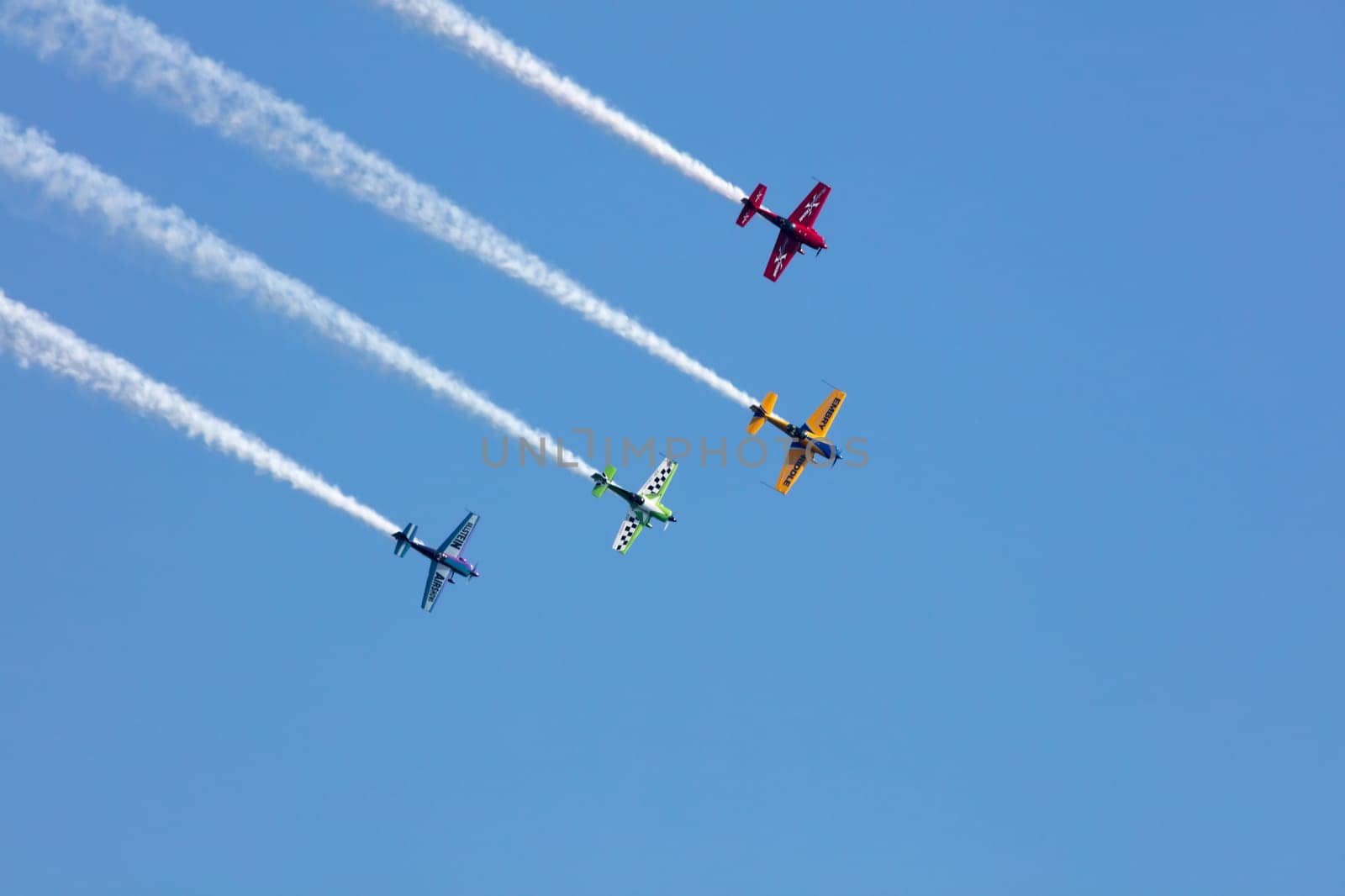 USA, Chicago - August 19: Matt Chapman lead with The Extra 330LX at Chicago Air and Water Show, with smoke to track the high flying planes on August 19, 2017