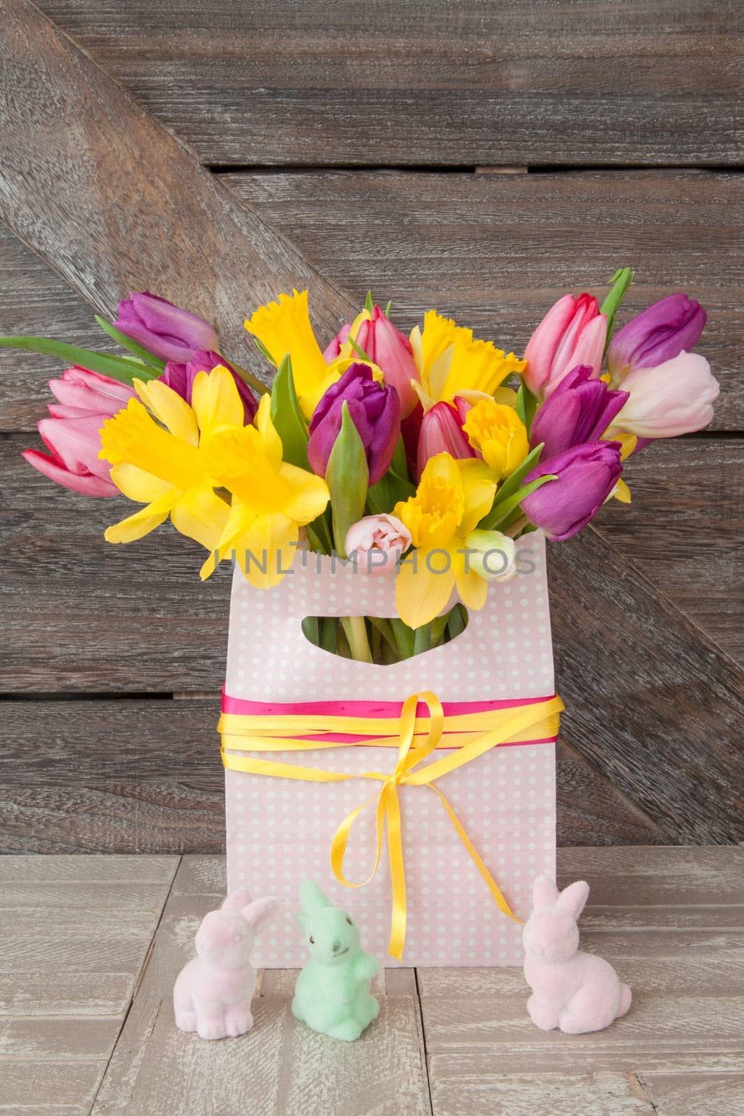 Easter bouquet with fresh tulips and daffodils
