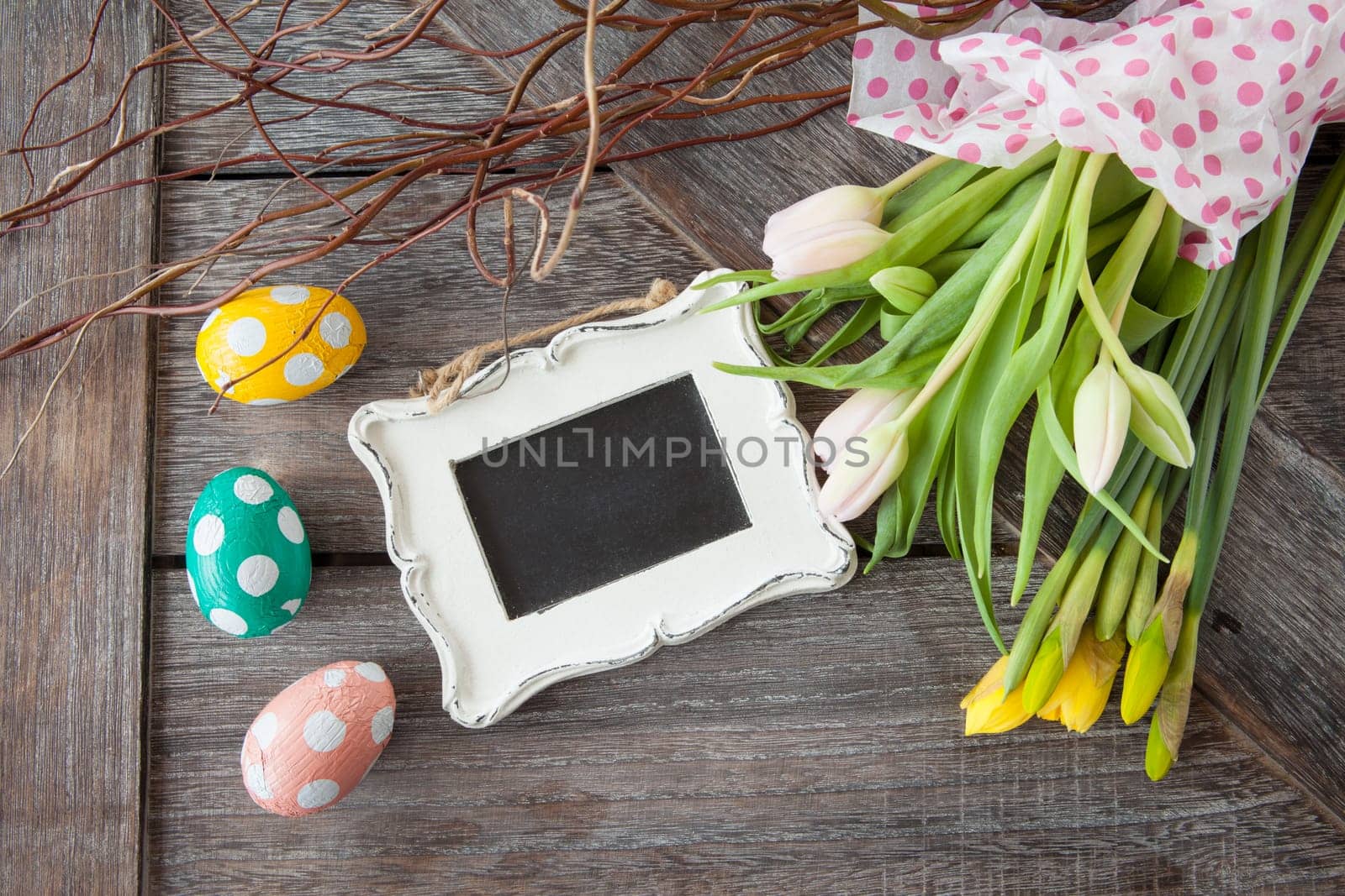 Easter decoration on a rustic wooden background