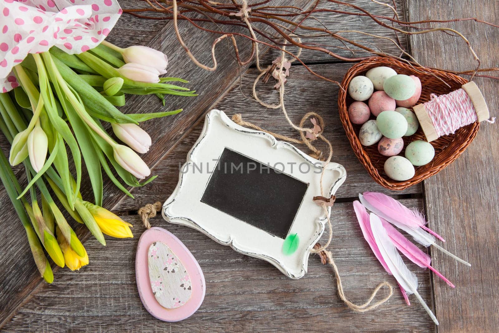 Easter decoration on a rustic wooden background
