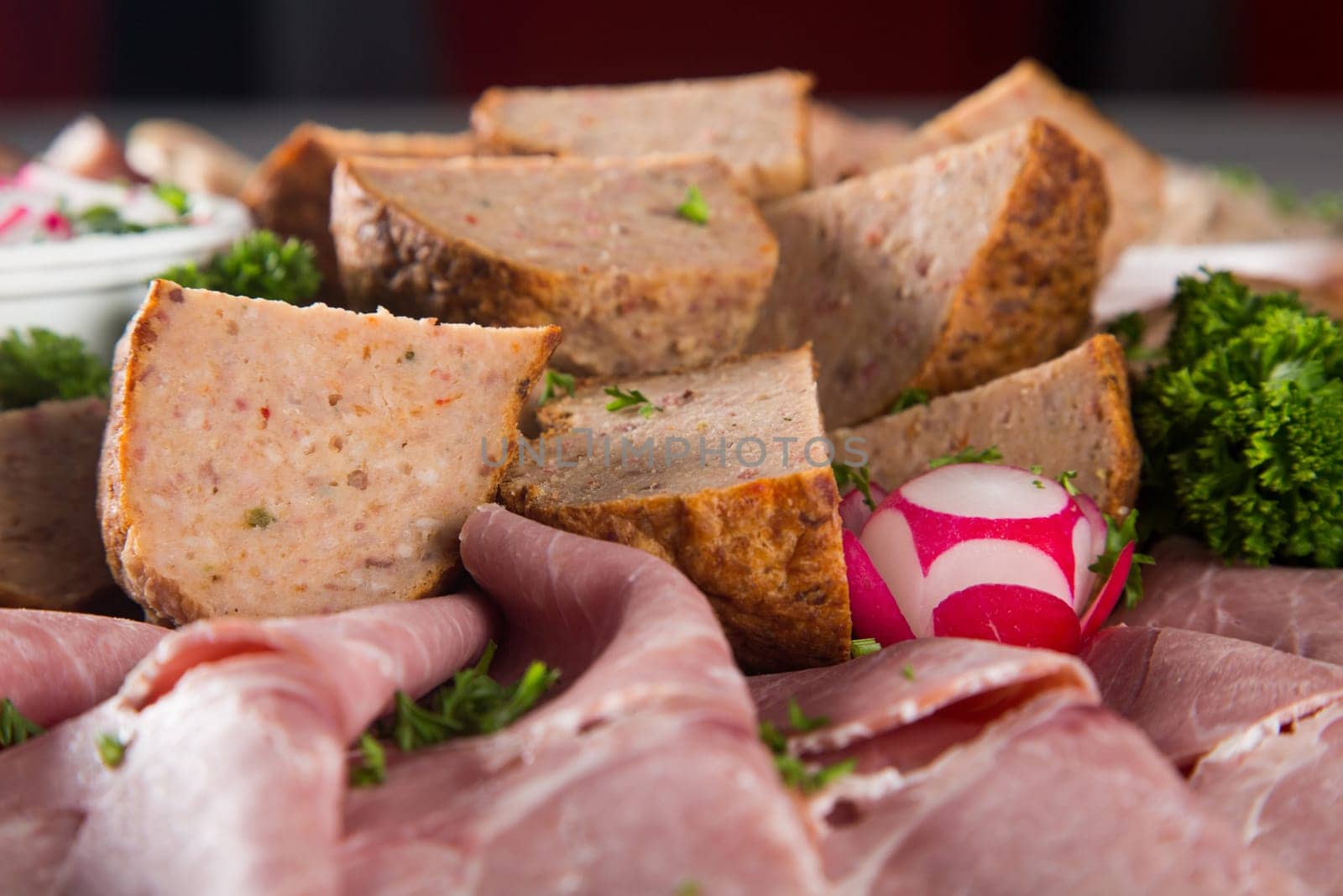 Assortment of meat delicatessen on a plate