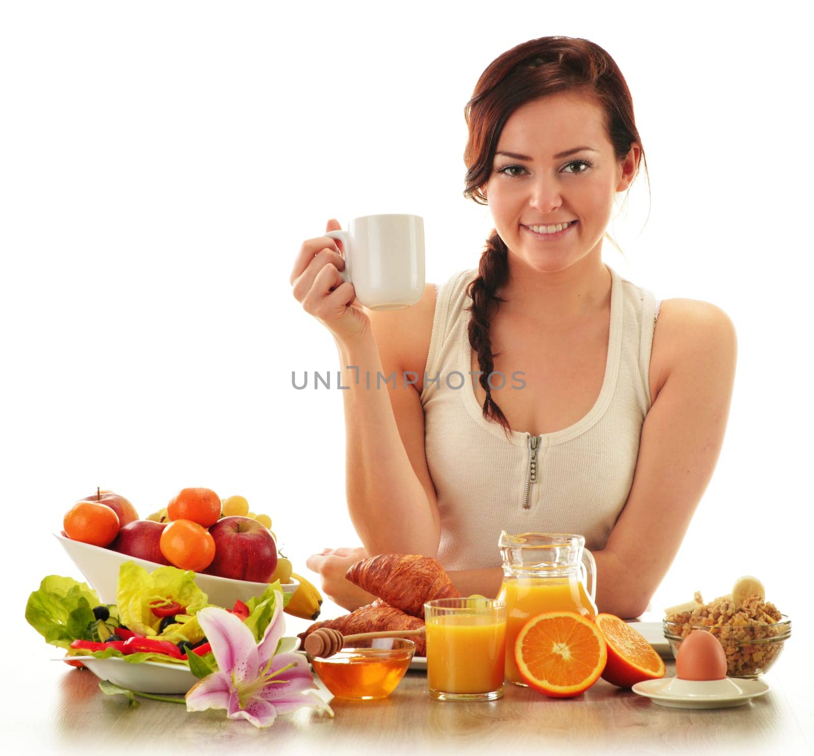 Young woman having breakfast. Balanced diet