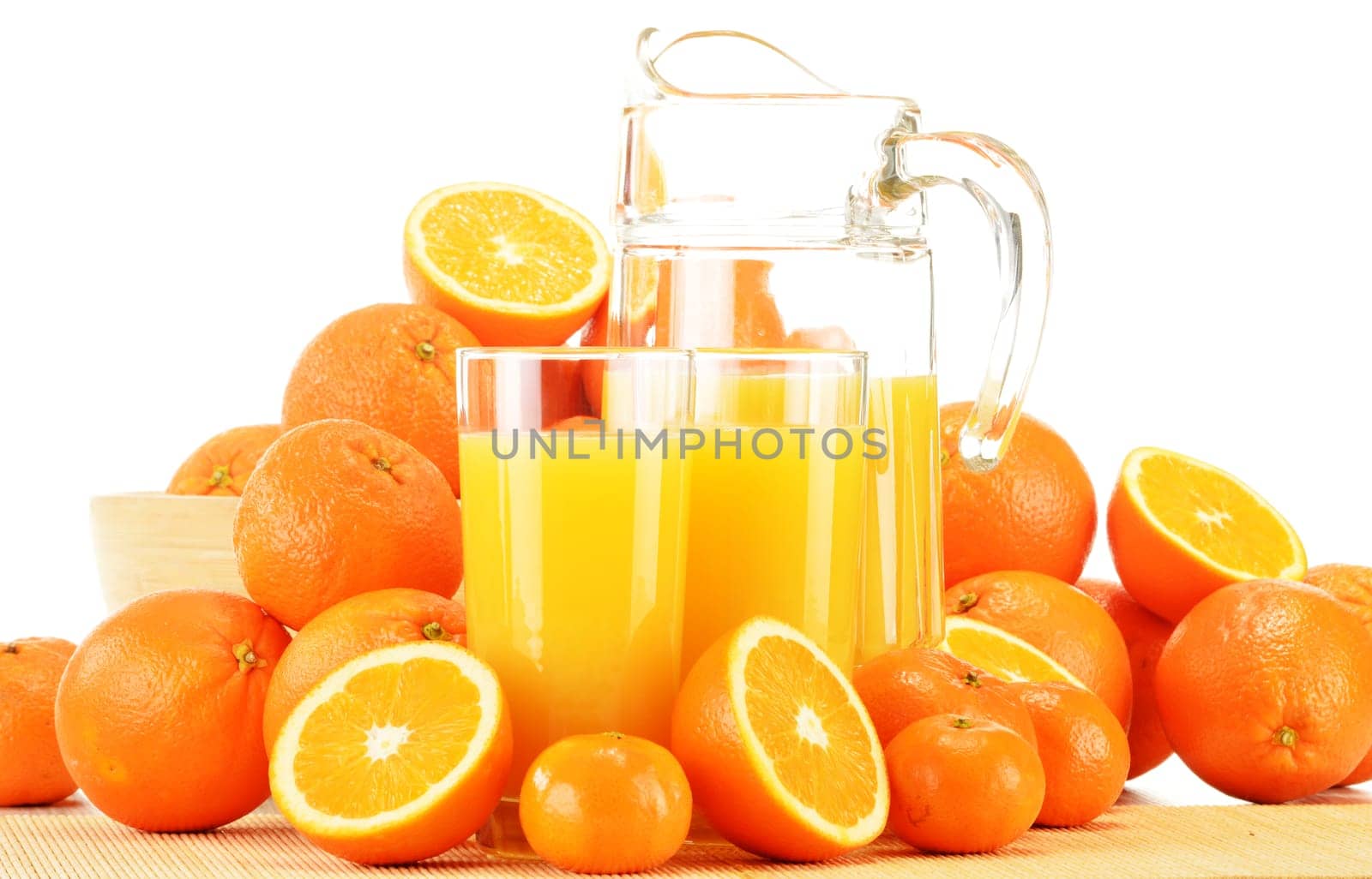 Composition with glasses of orange juice and fruits