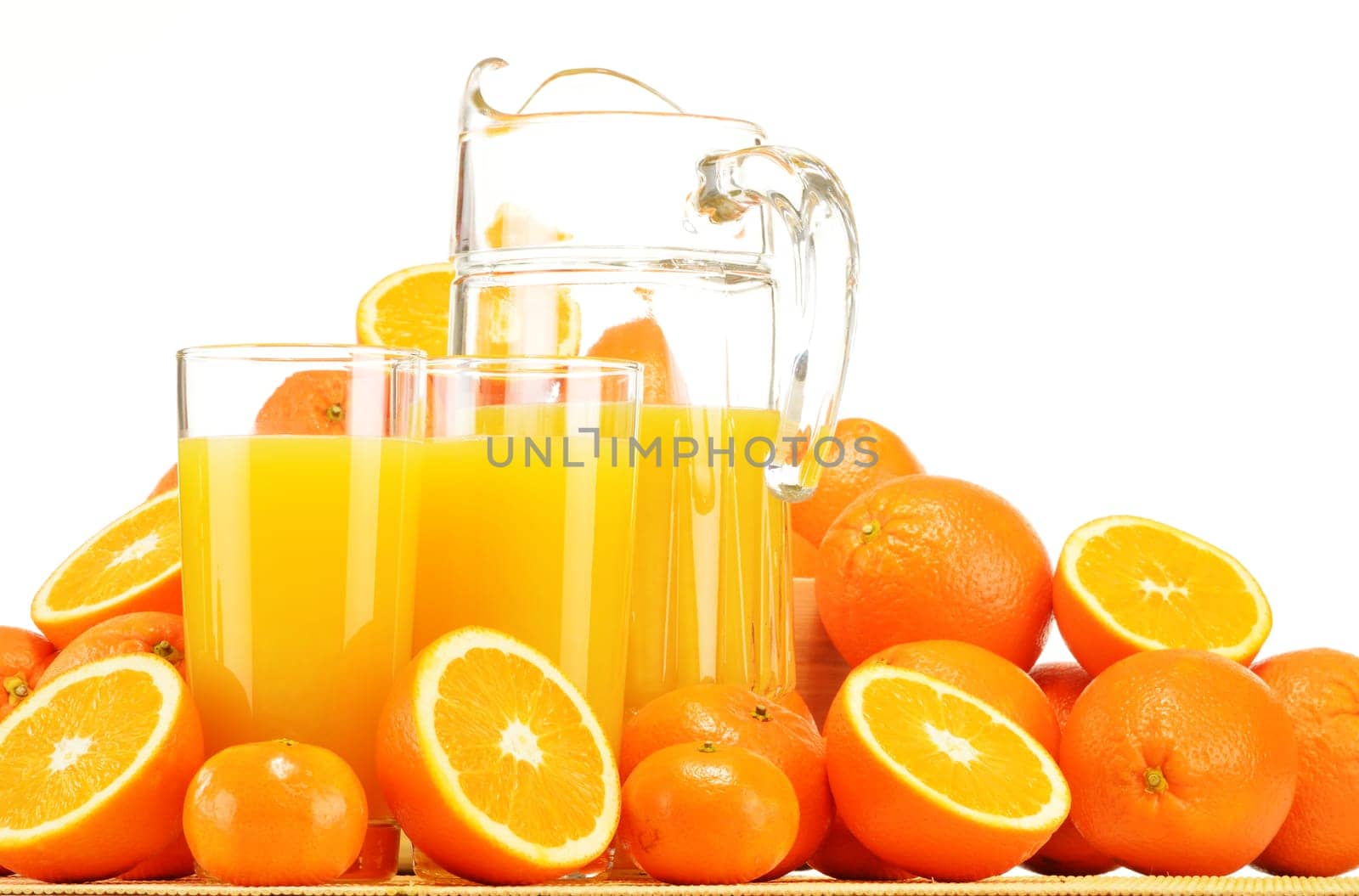 Composition with glasses of orange juice and fruits