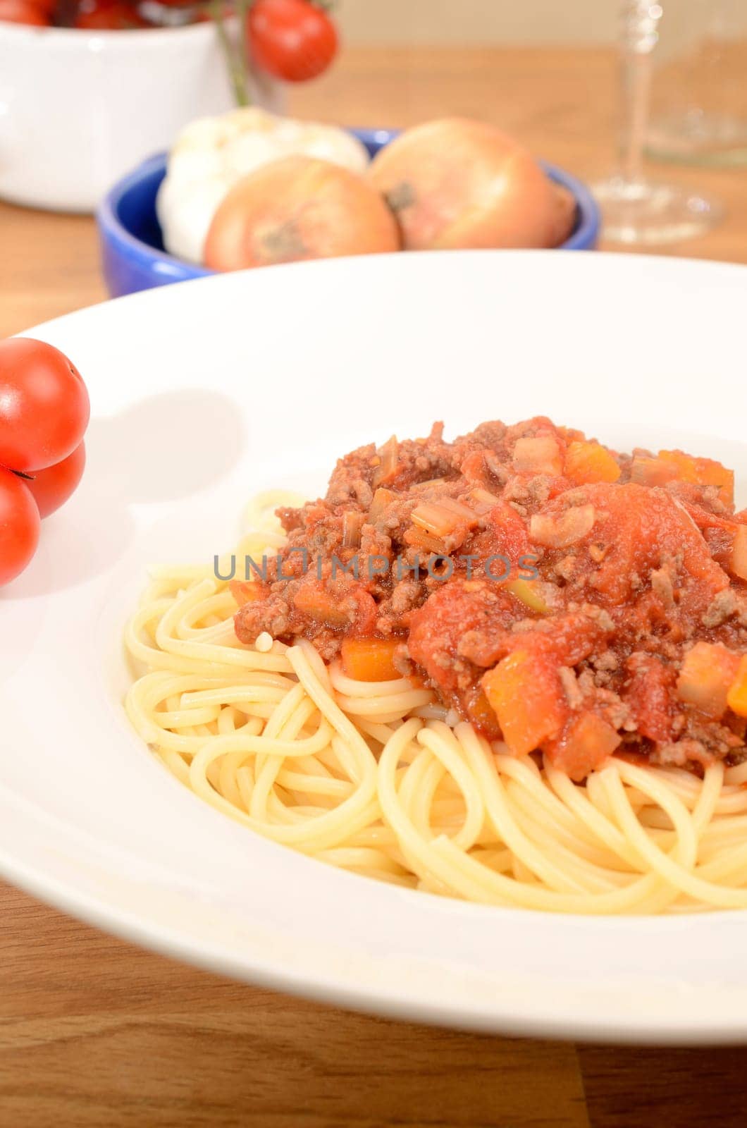 Spaghetti with bolognese on a white plate