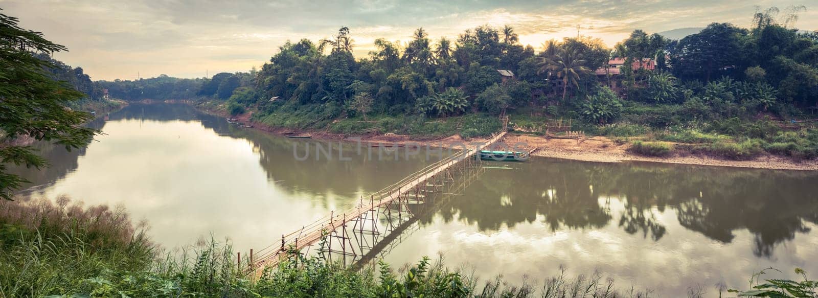 Beautiful view of a bamboo bridge. Luang Prabang. Laos landscape. Panorama