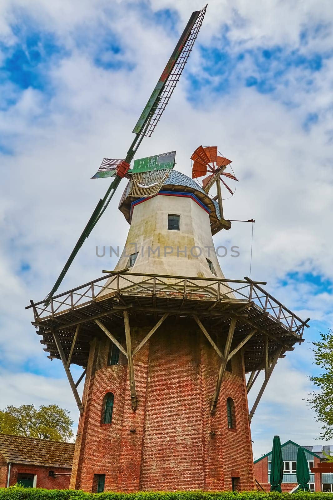 A Windmill under the Cloudy Sky