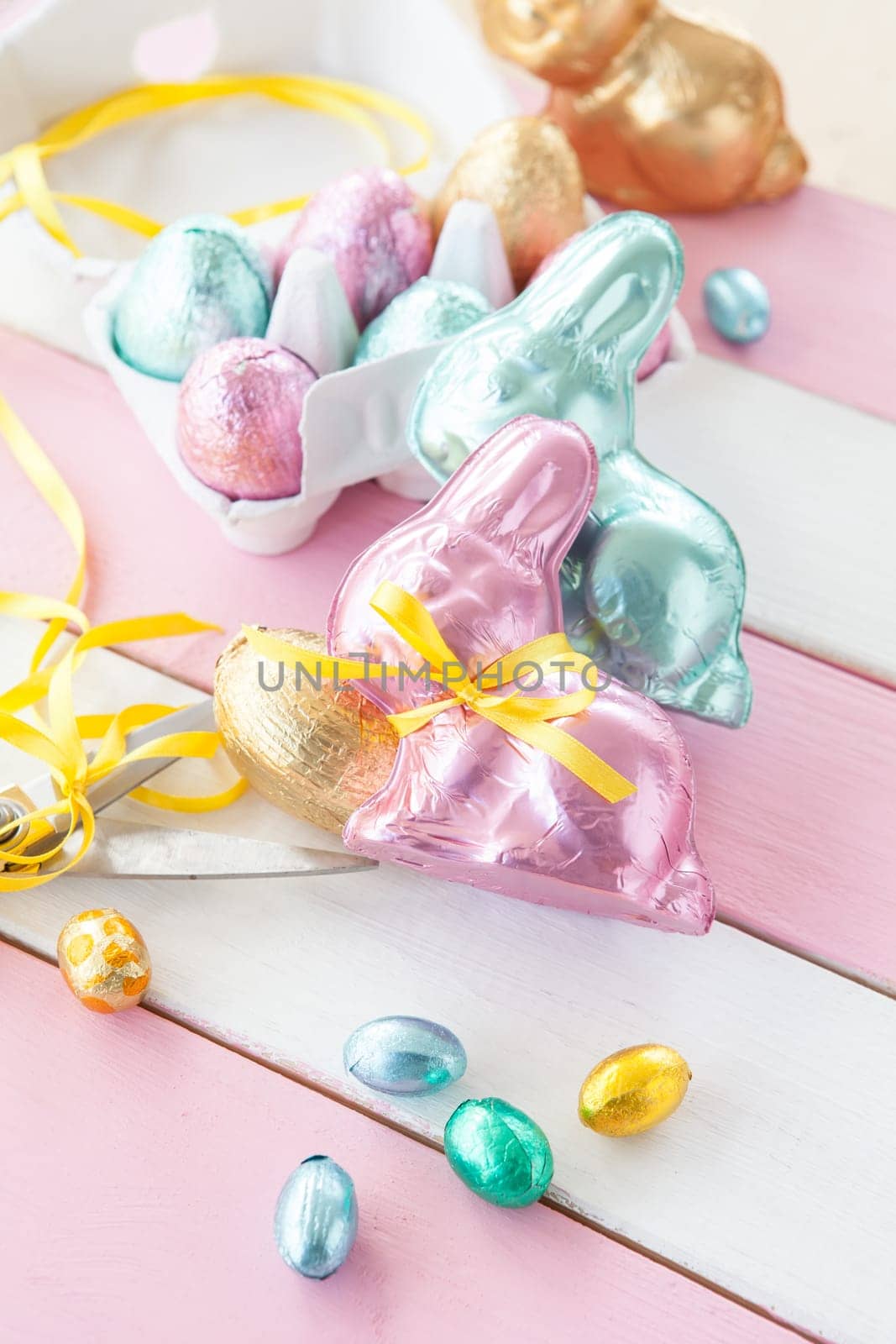 Colourful Easter bunny and chocolate Easter eggs