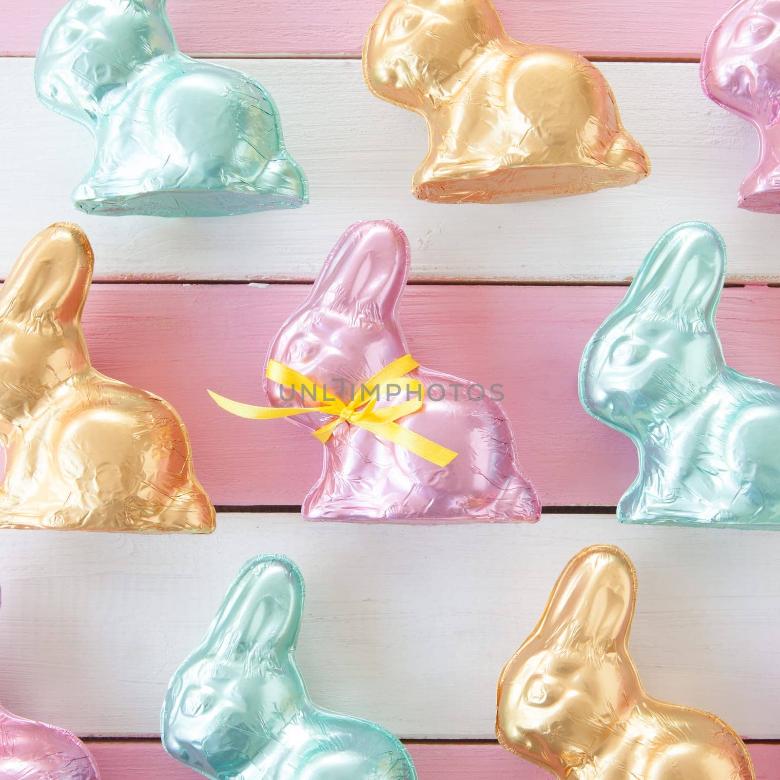 Lots of colorful chocolate Easter bunnies