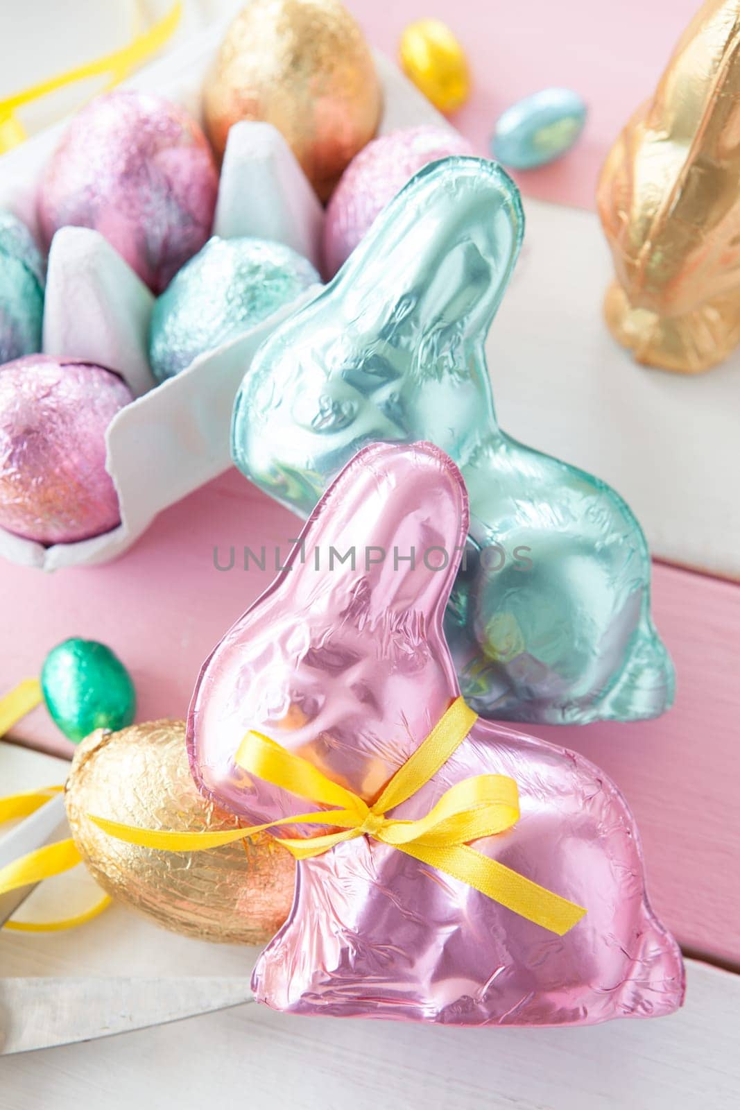 Colourful Easter bunny and chocolate Easter eggs