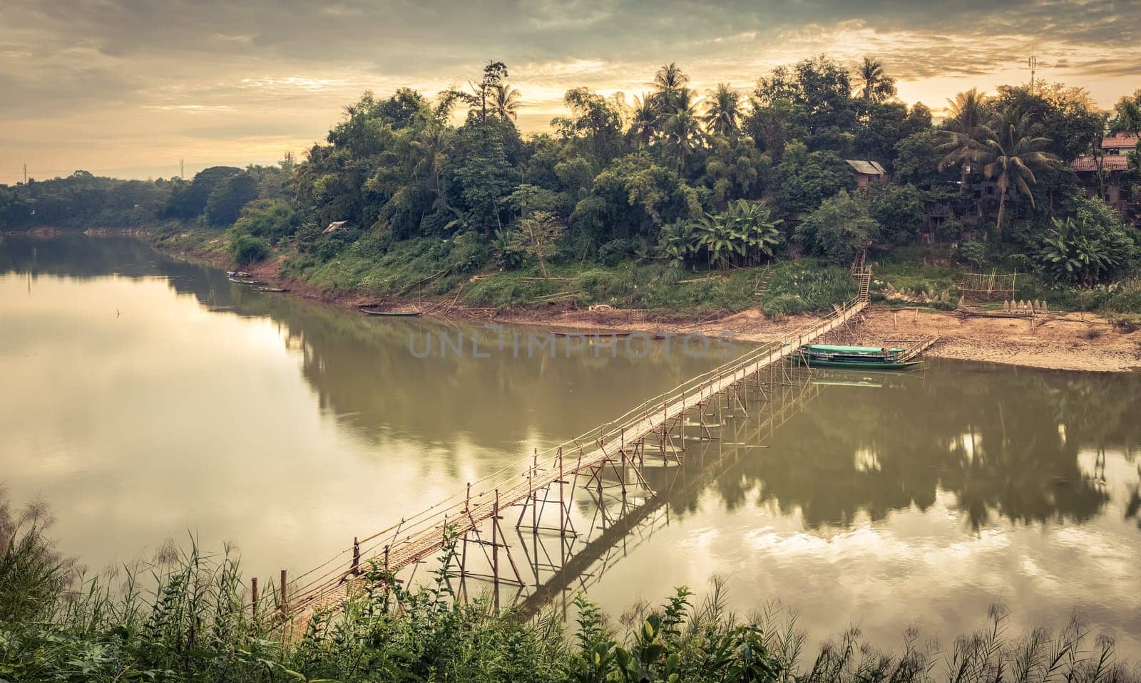 Beautiful view of a bamboo bridge. Luang Prabang. Laos landscape. Panorama
