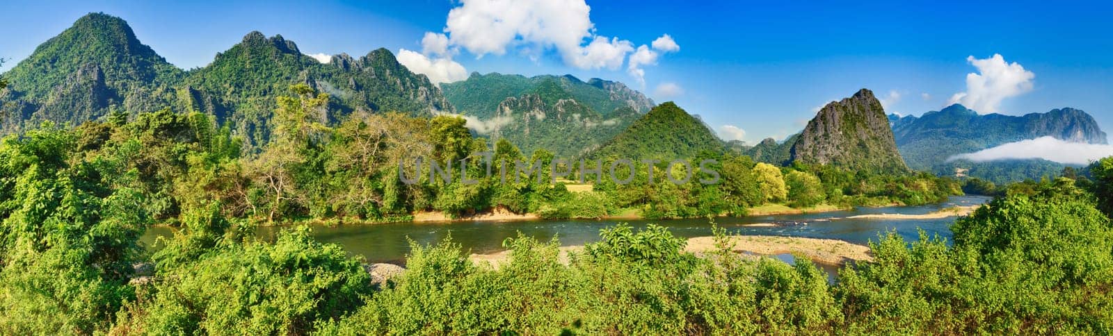 Amazing landscape of Nam Song river among mountains. Vang Vieng. Laos panorama.