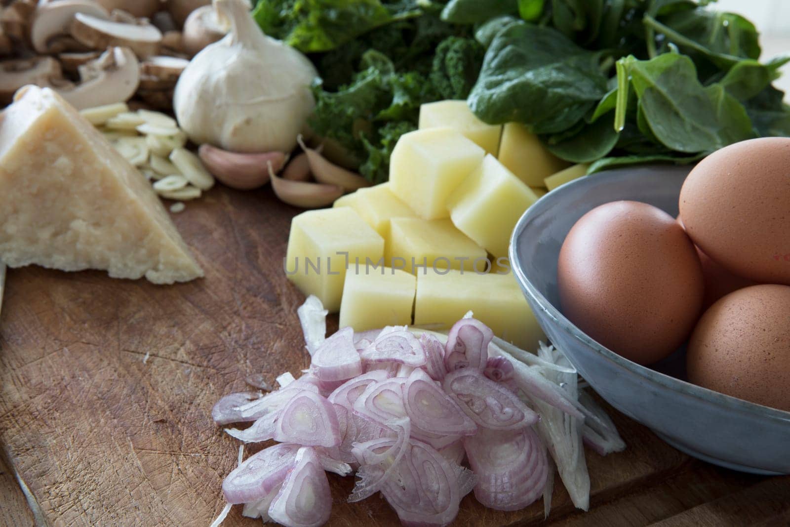 Fresh sliced shallots with eggs, potatoes and fresh parmesan.