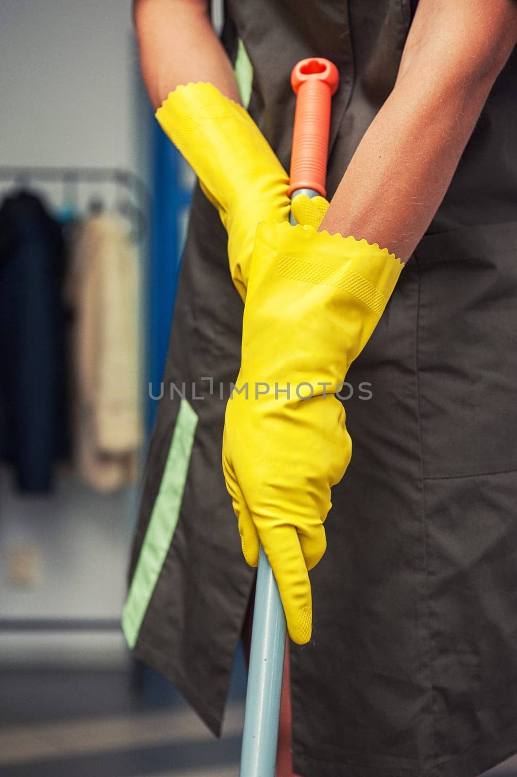 Cleaning concept. Closeup photo of woman cleaning at the home