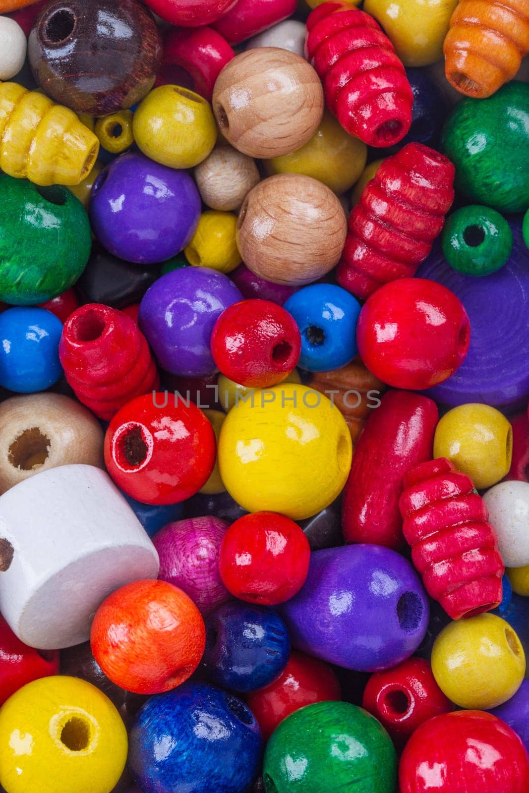 Lots of colorful wooden beads for crafting