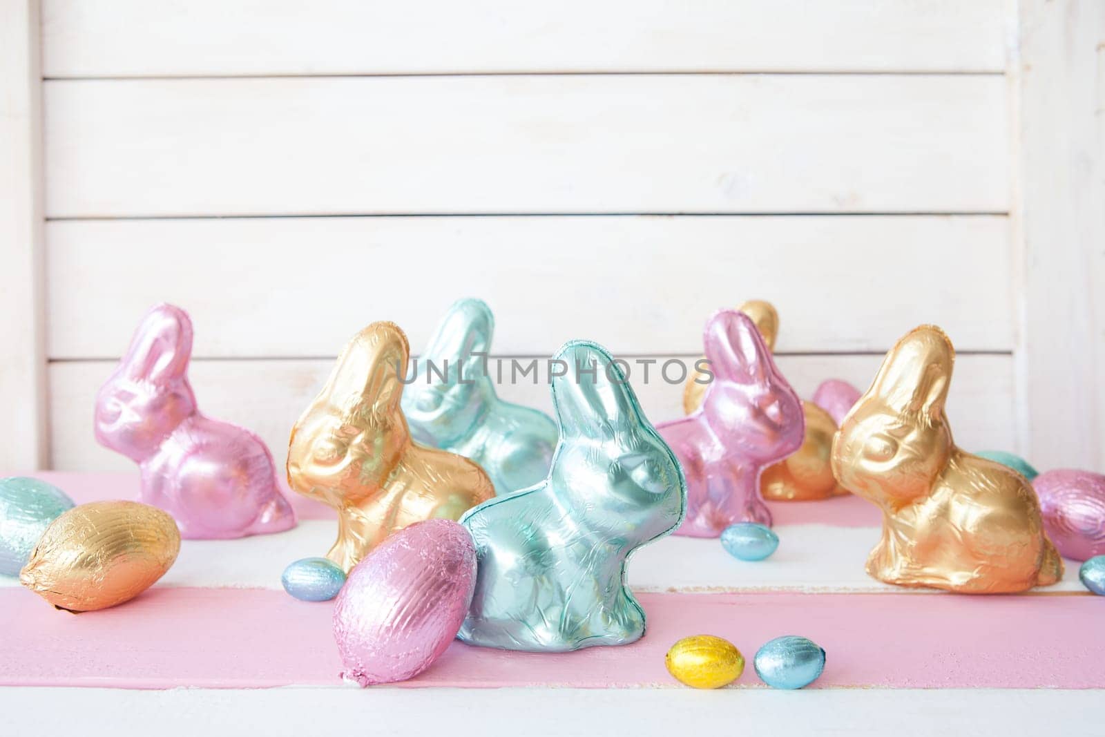 Colourful Easter bunny and chocolate Easter eggs