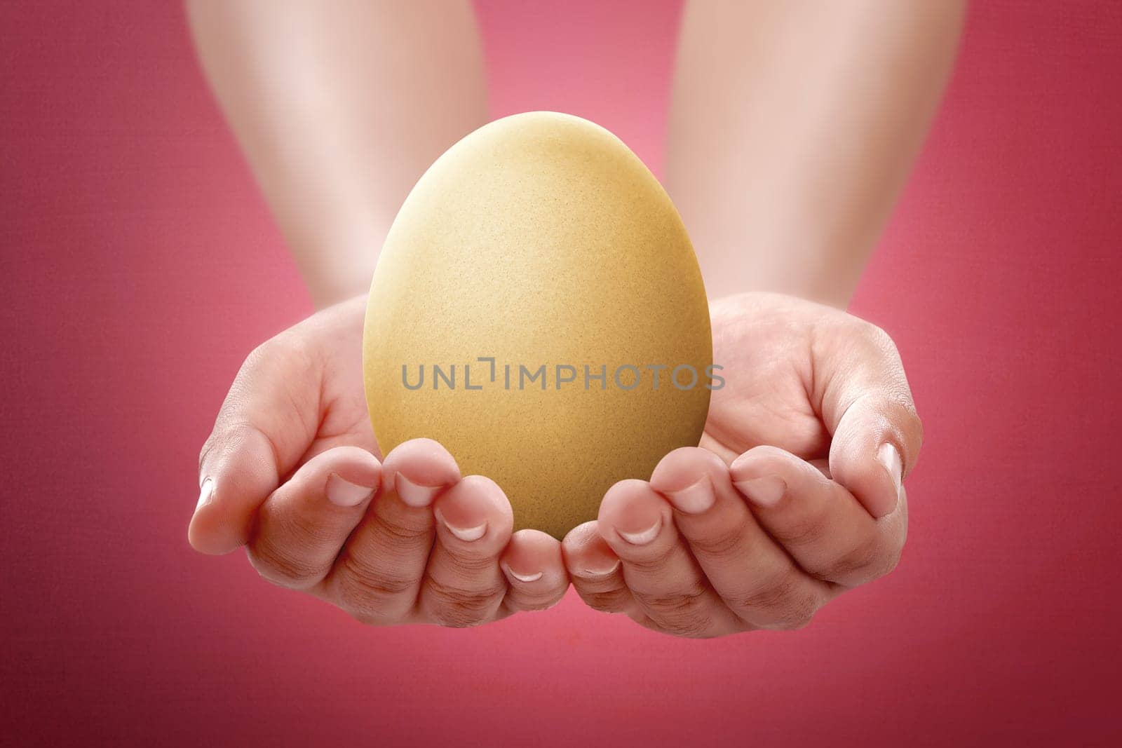 Image of people hand hold plain egg. Easter concept, you can design your own pattern at the egg