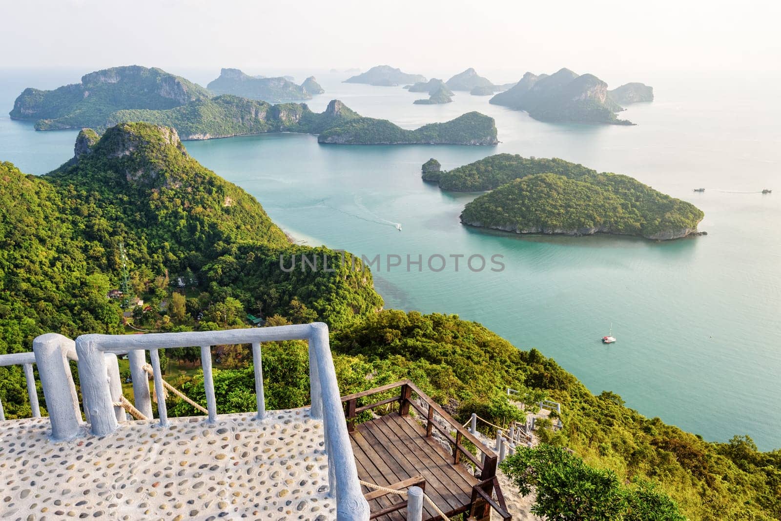 Podium viewpoint on peak mountain at Ko Wua Ta Lap island and high angle view beautiful nature landscape of island and sea in Mu Ko Ang Thong National Marine Park, Surat Thani, Thailand