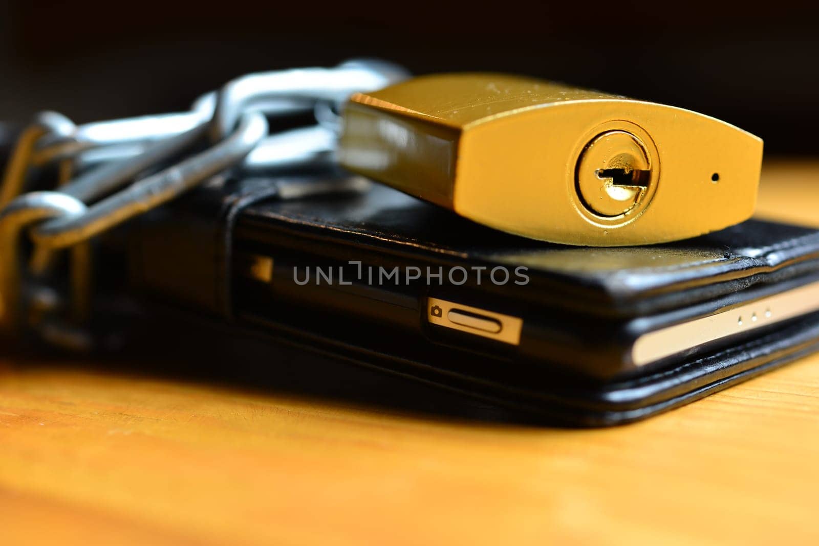 Mobile phone security chain with lock on the Internet Phone