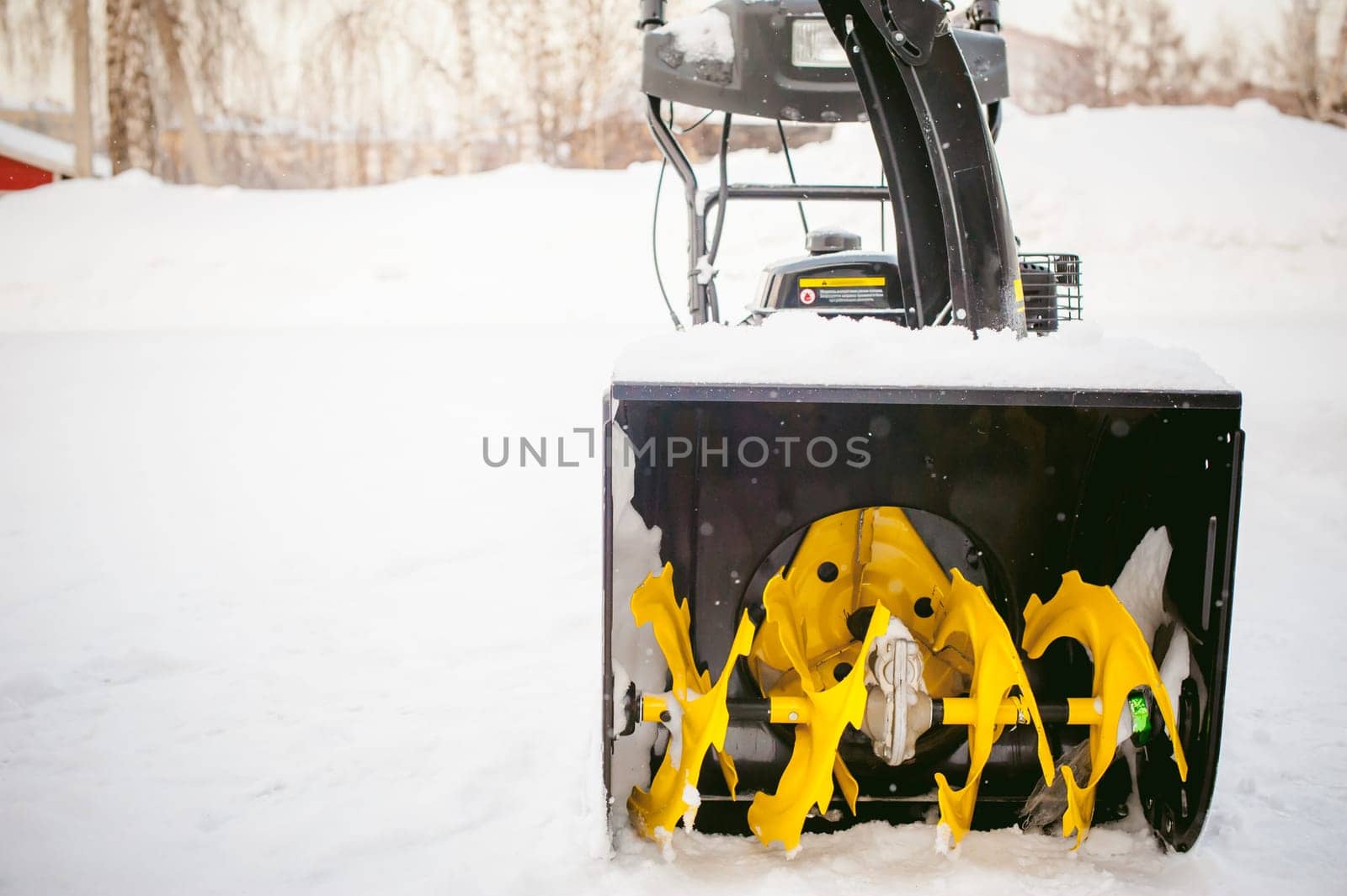 close up on snow blower for snow removal in winter