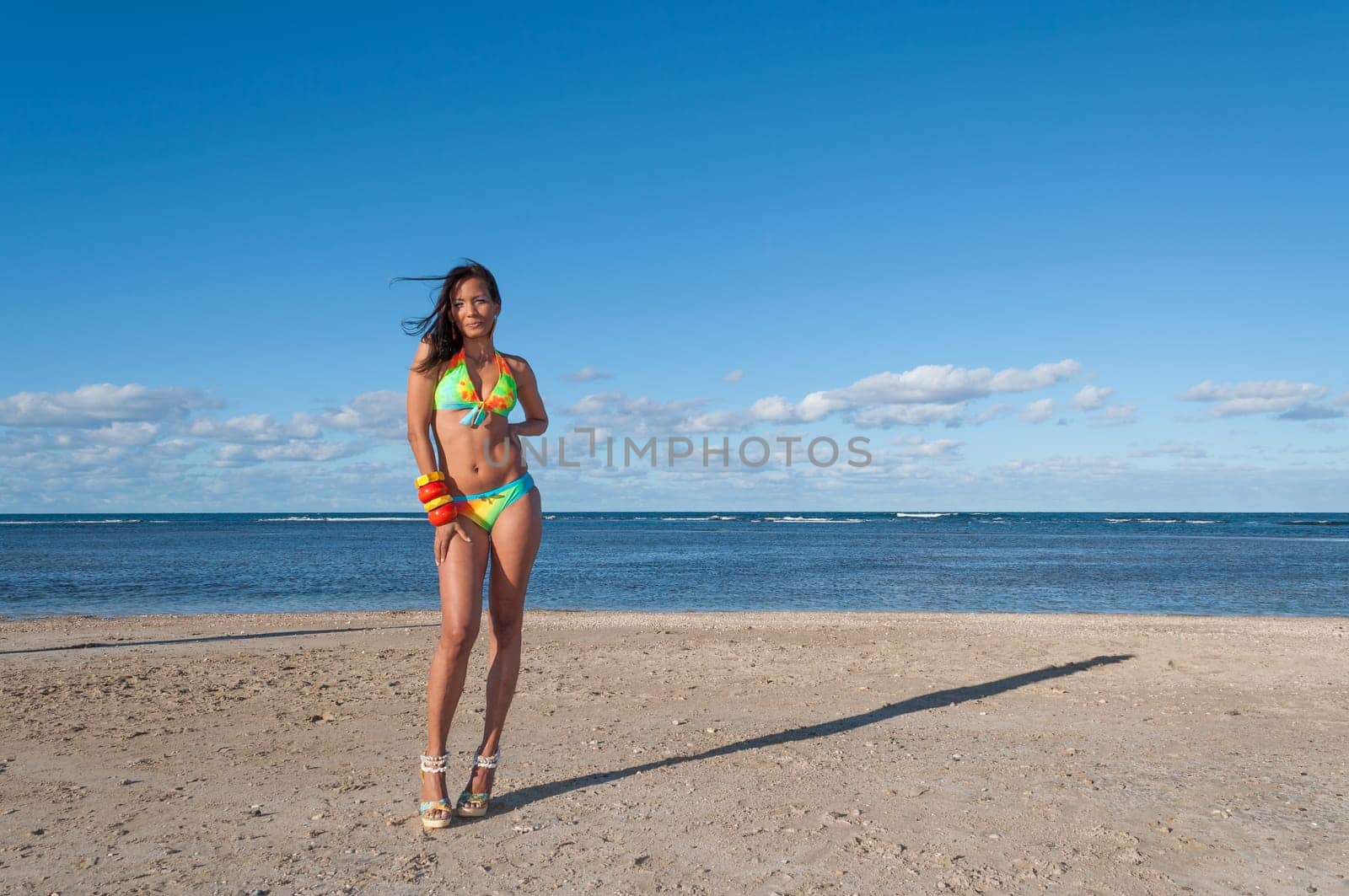Beautiful and sexy girl posing at the beach in dominican republic dressing a bikini