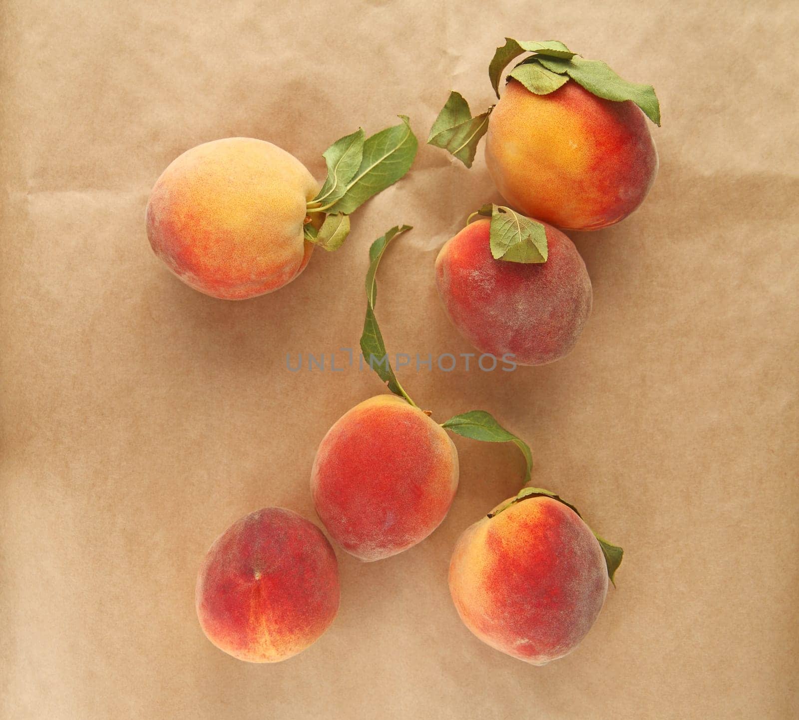 Overhead of fresh, ripe peaches with copy space