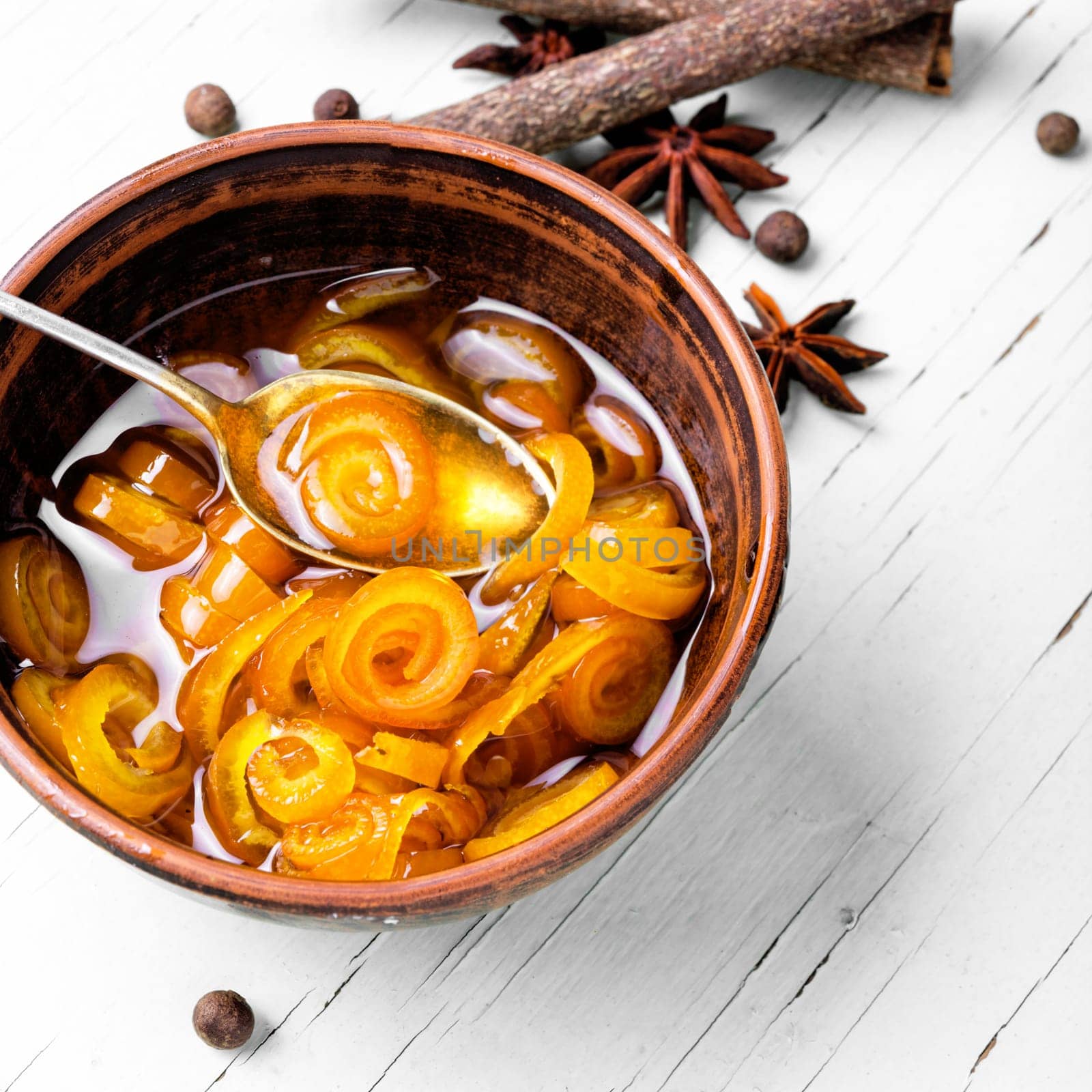 Orange candied peels orange in retro tray.Orange dessert