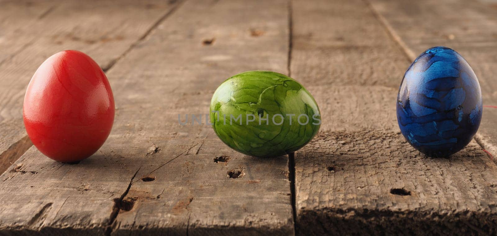 Easter egg on a rustic wooden table, Happy Easter background