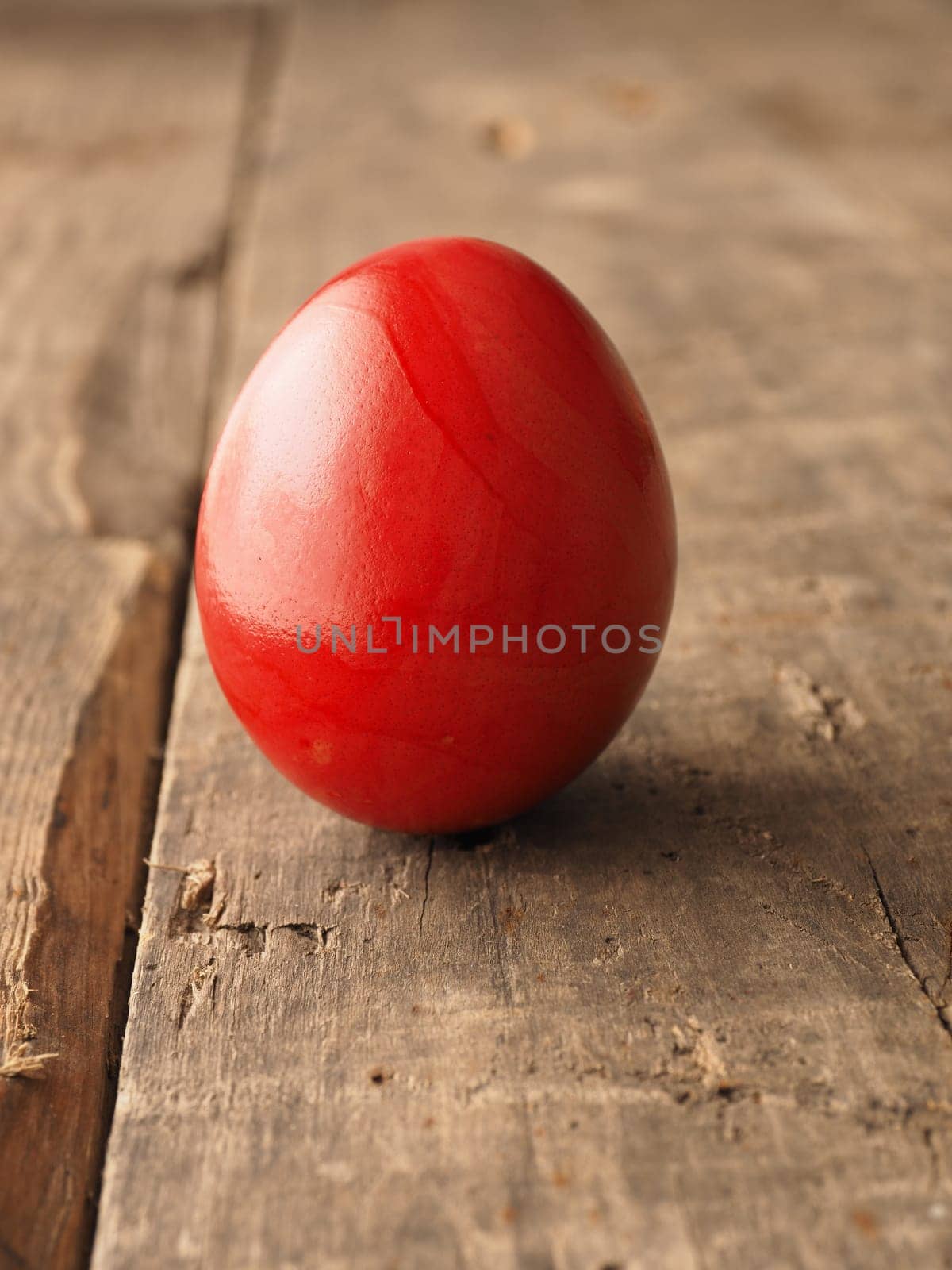 Easter egg on a rustic wooden table, Happy Easter background