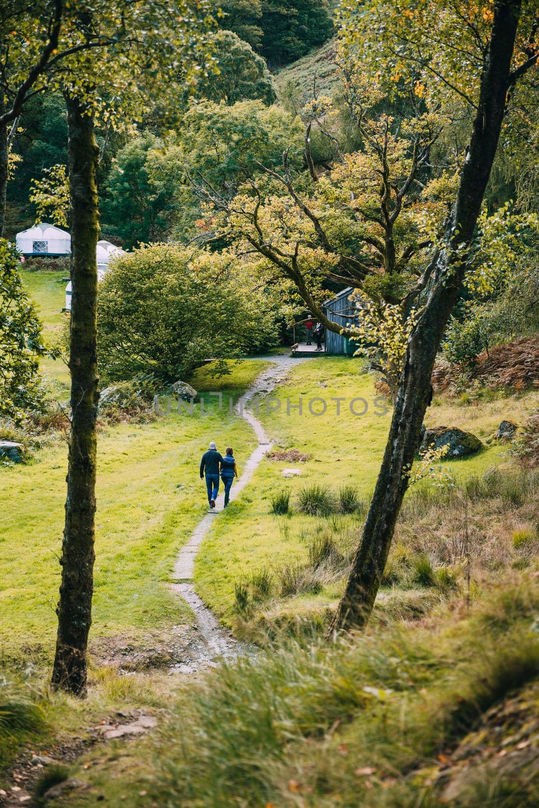 Senior couple have returned back to their campsite after a long hike through the Lake District.