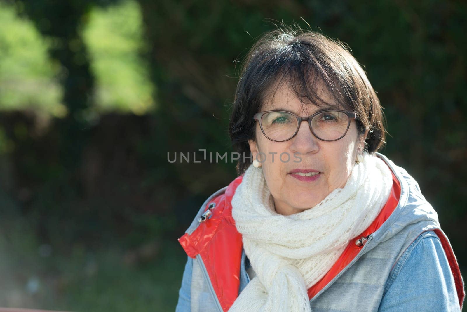 portrait of a middle-aged woman in the spring sun