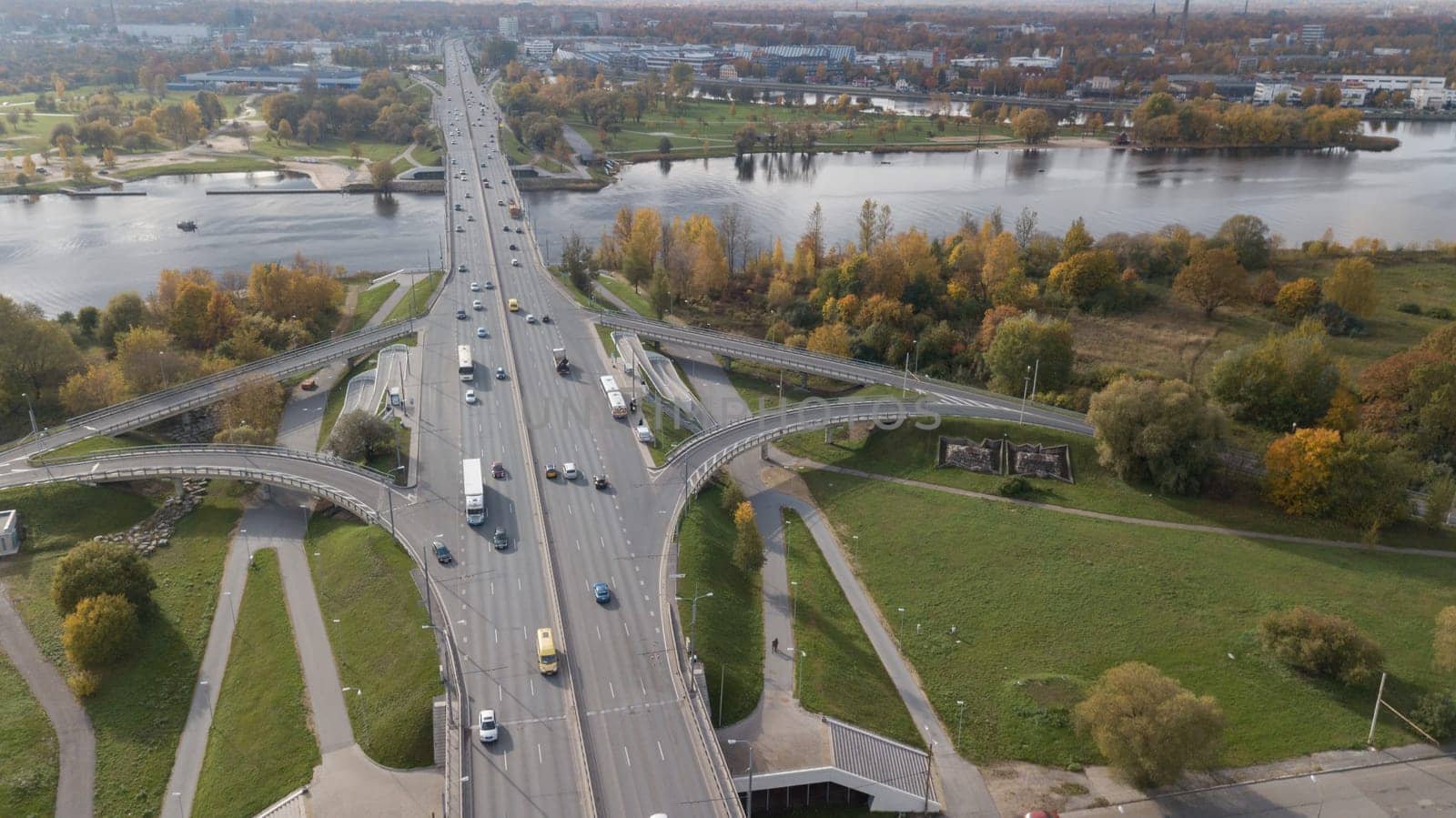 Cars on river Daugava bridge Riga Latvia aerial drone top view