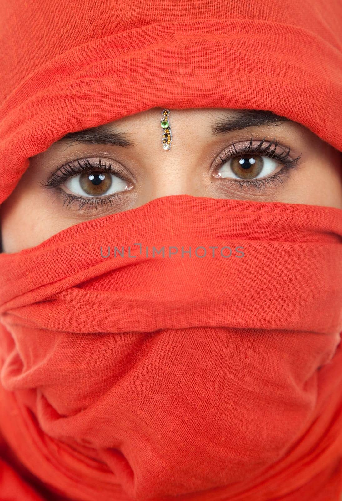 young woman with a veil, close up portrait, studio picture