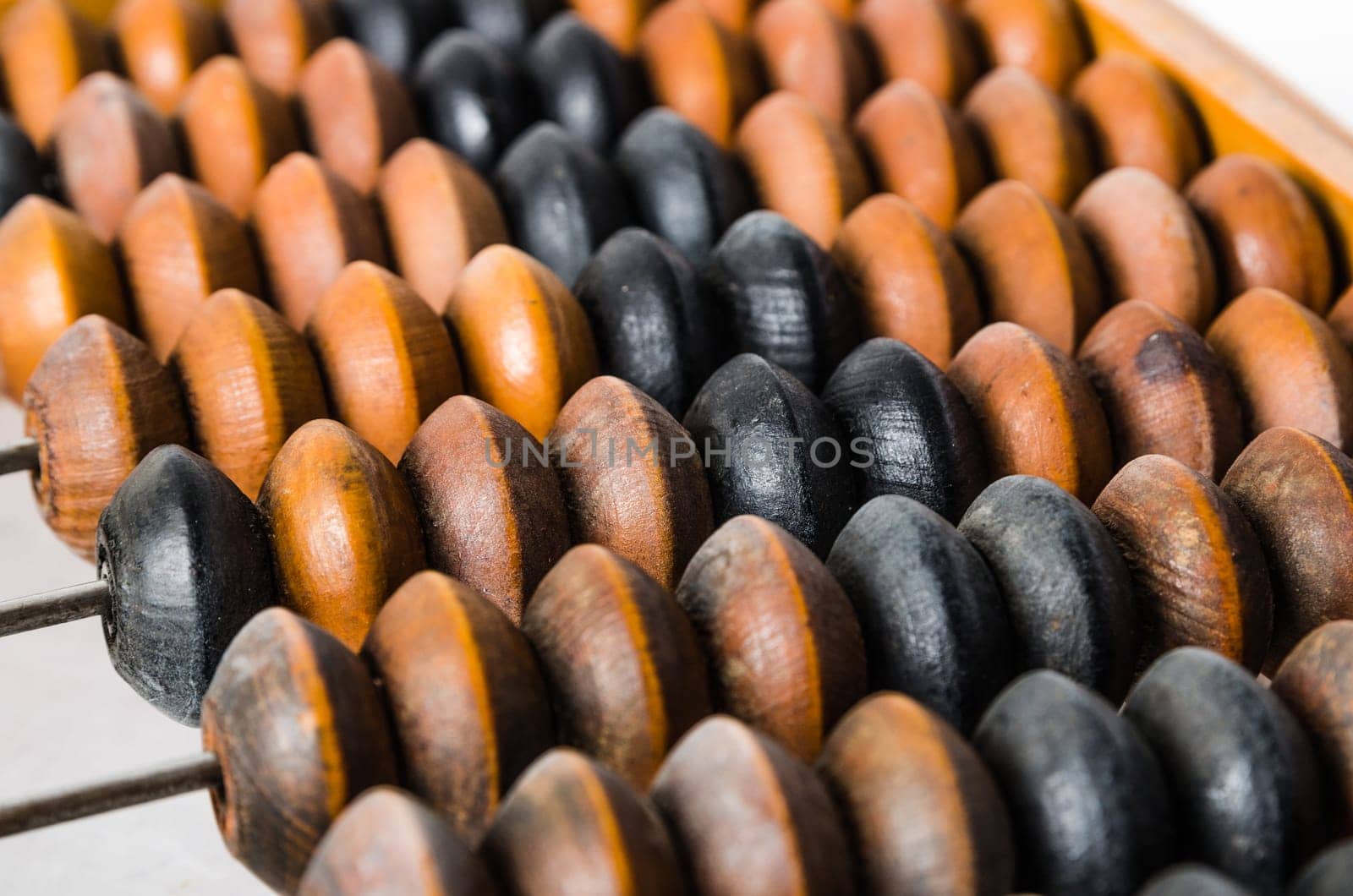 Old abacus, close-up isolated on white