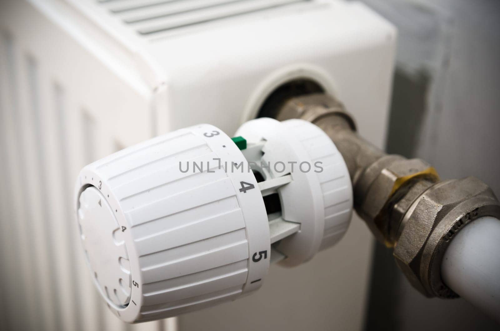 The thermostat on the radiator, close-up